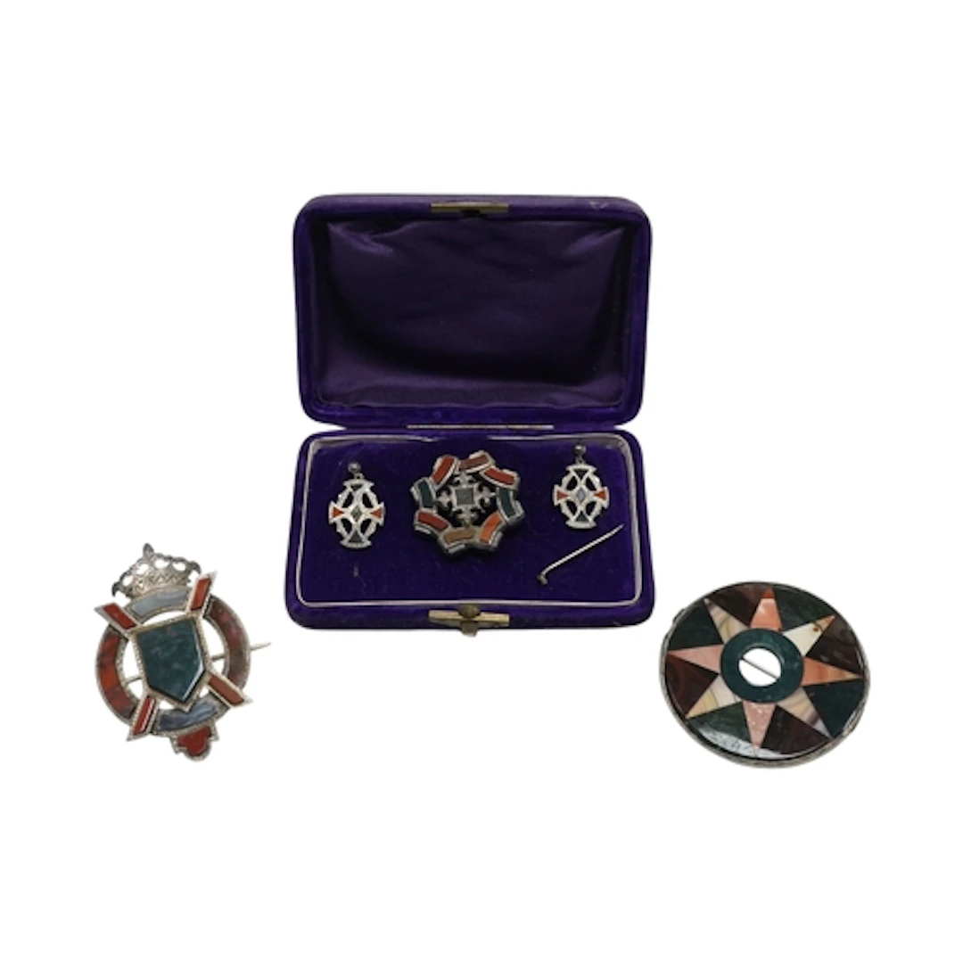 A cased white metal and Scottish hardstone demi parure, comp...