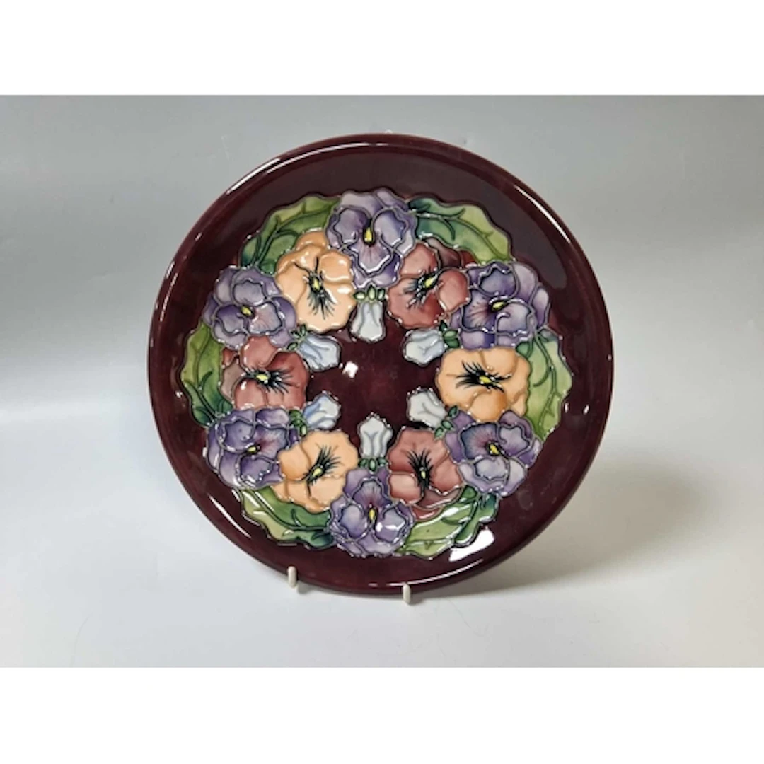 A 1994 MOORCROFT POTTERY 'PANSY' PATTERN LARGE DISPLAY PLATE...