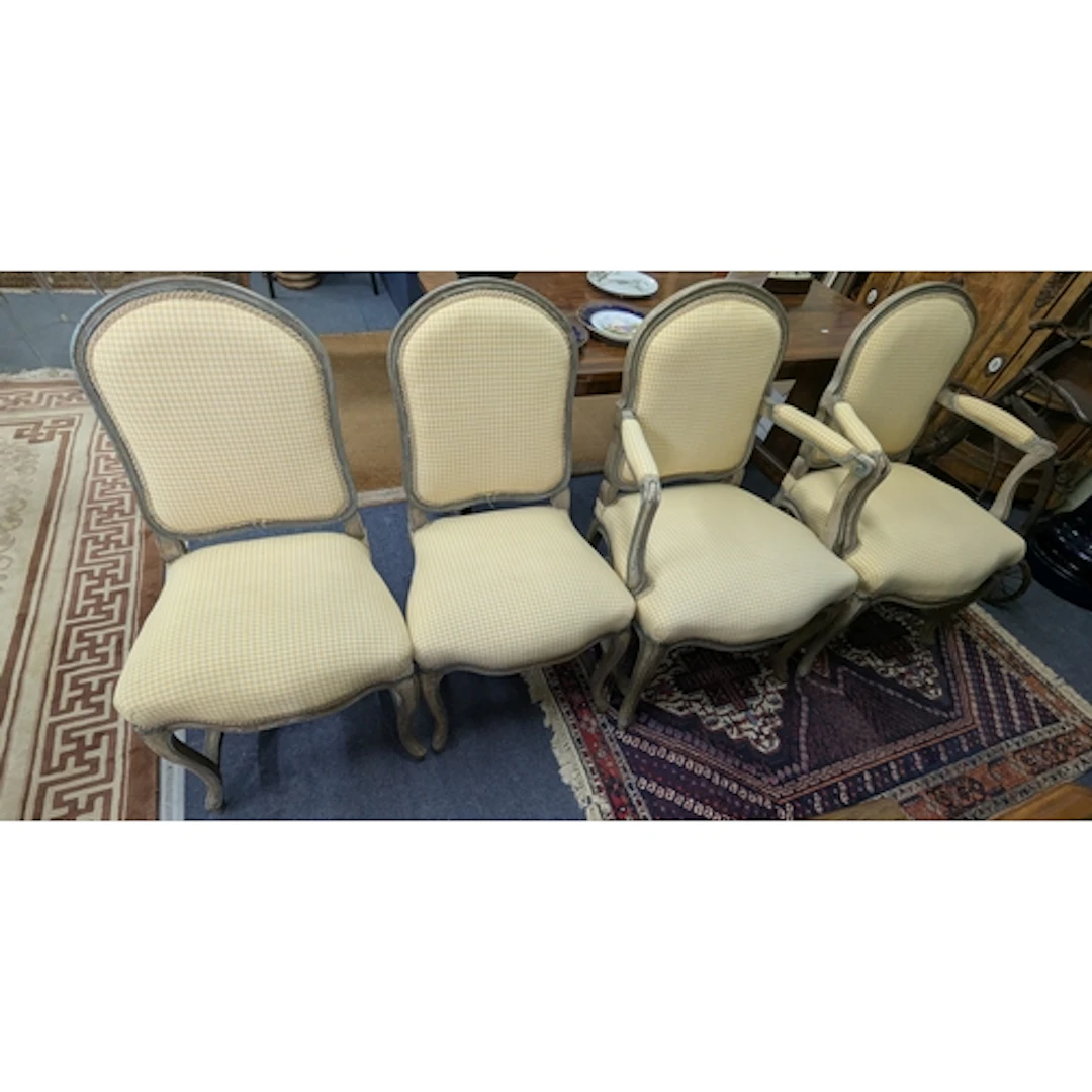 A set of four French chairs with yellow and white gingham up...