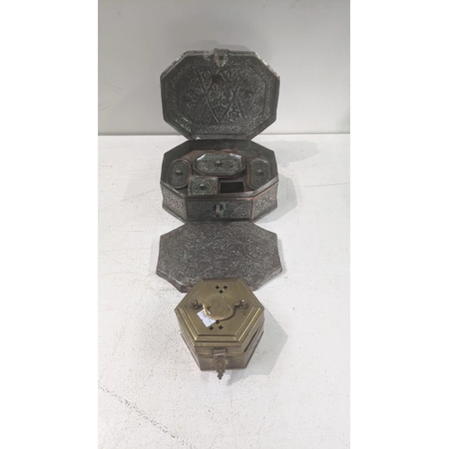 A vintage Middle Eastern copper paan daan or spice tin, havi...