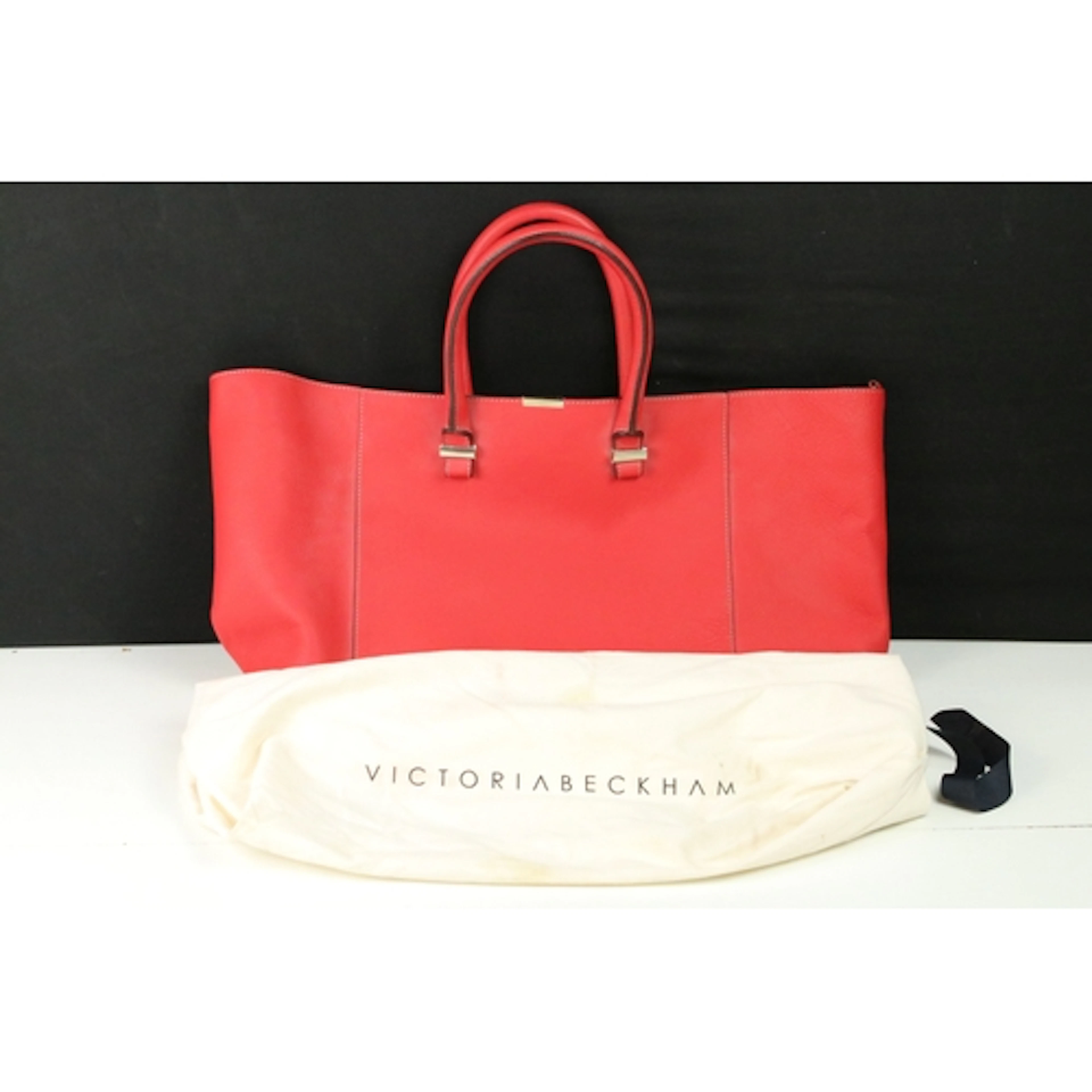 Victoria Beckham red leather tote bag, No. 32, having gold t...