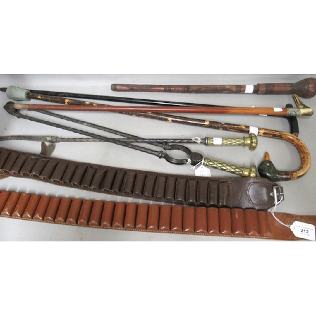 Two leather cartridge belts, together with four various walk...