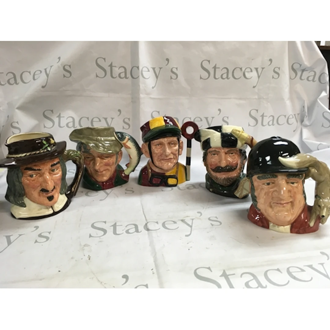 A mixed collection of Doulton character jugs including Izaak...