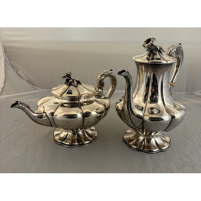 A large silver plated tea & coffee pot