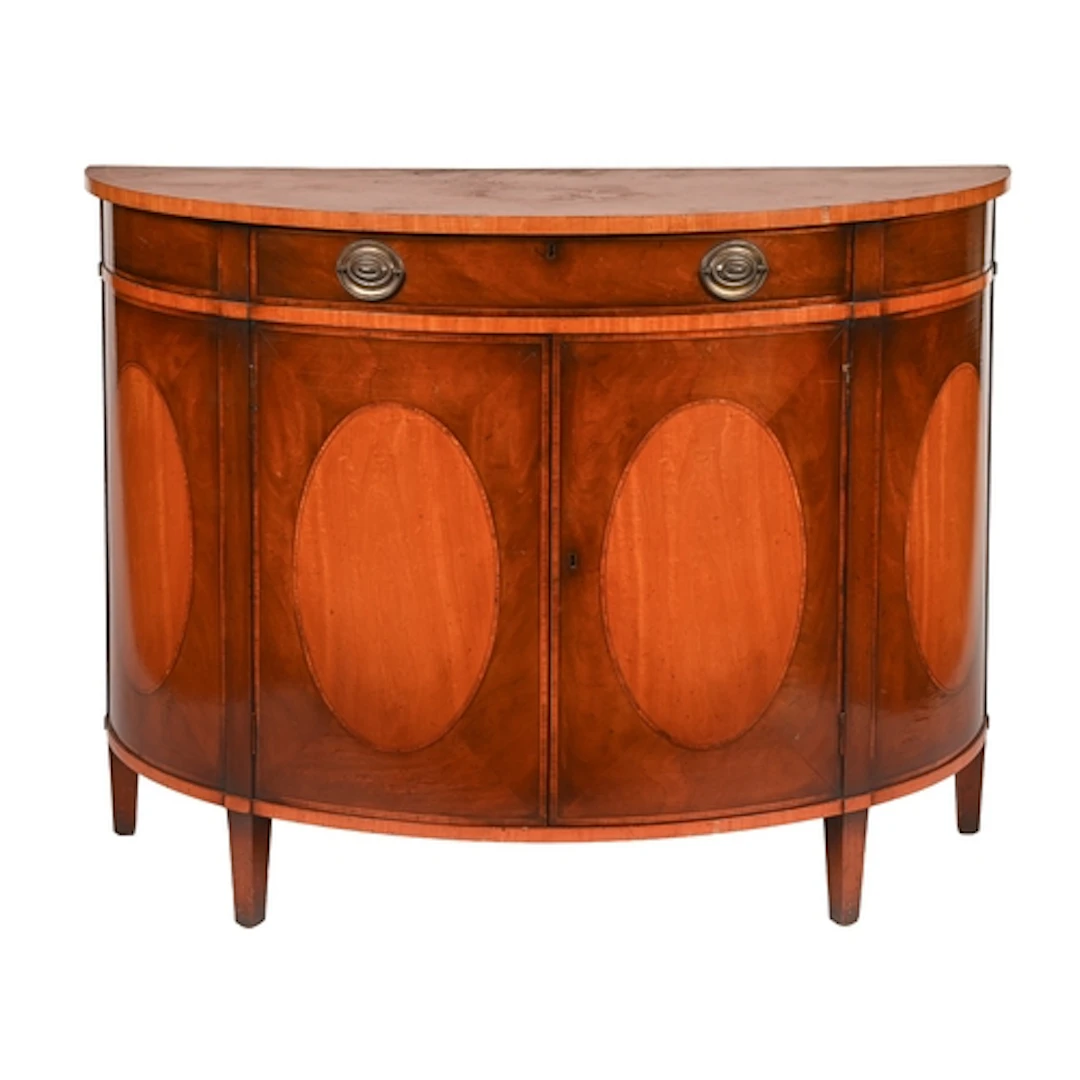 A mahogany and satinwood demi lune commode, early 20th c, wi...
