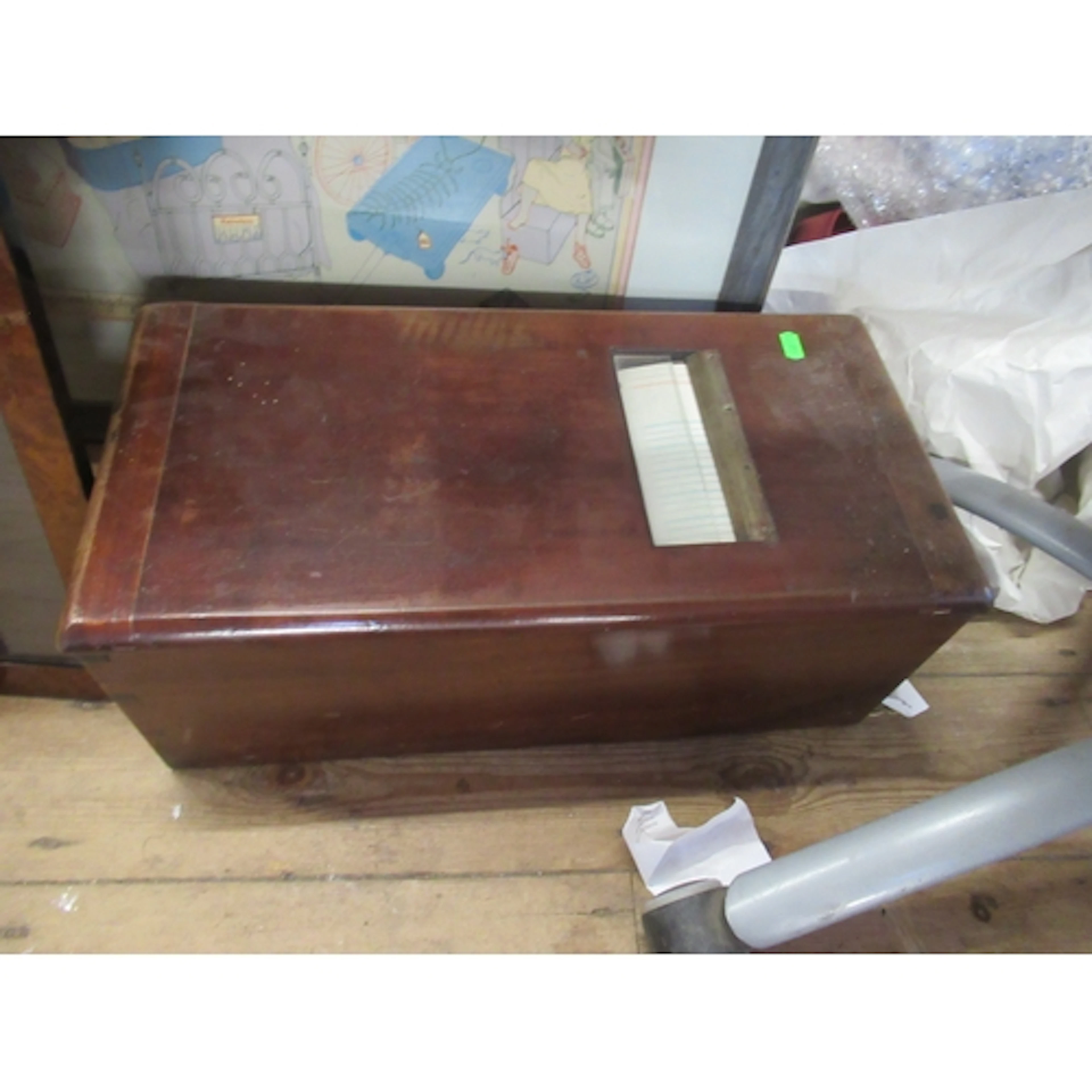 An antique Gledhill's mahogany shop till with penny coins