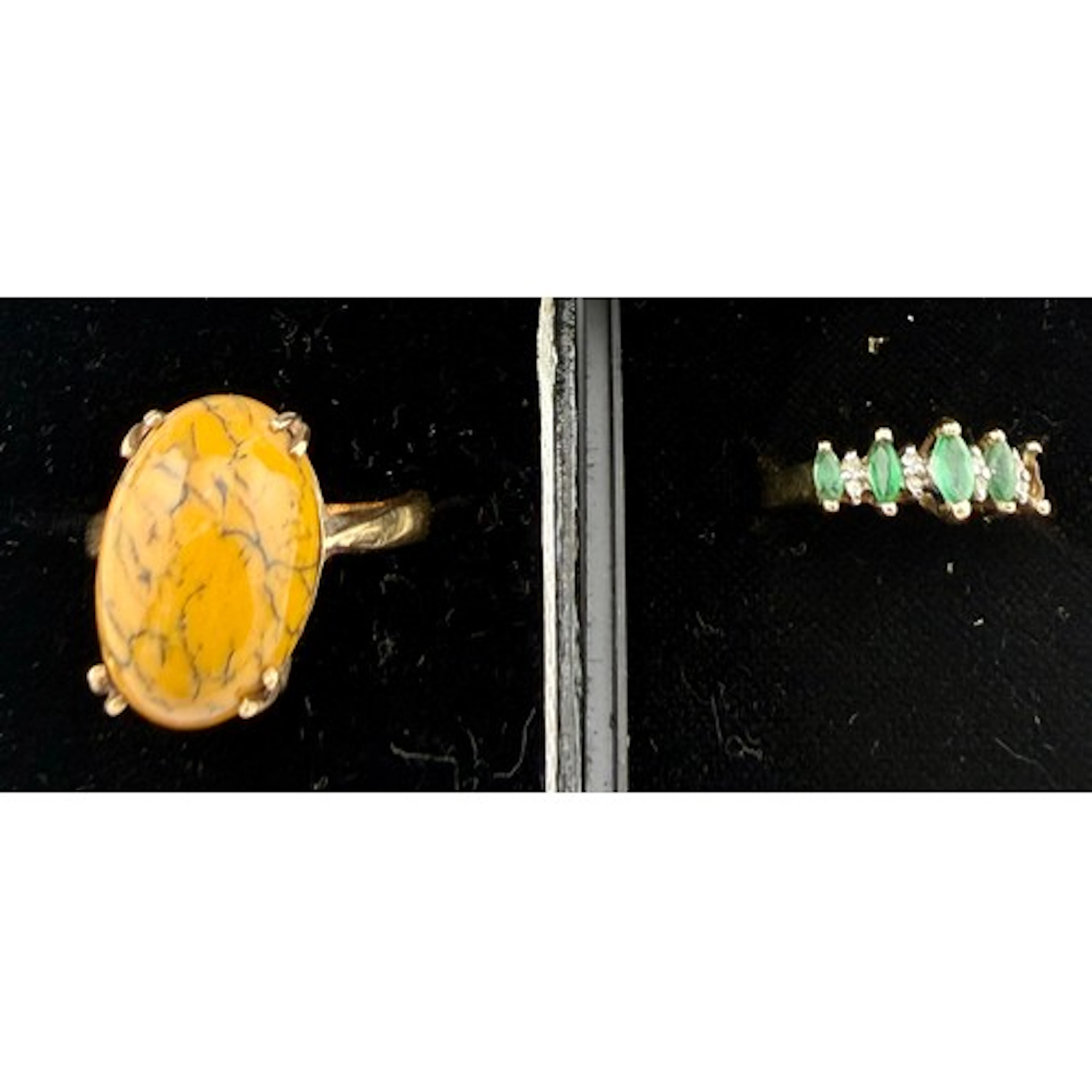 Two 9 carat gold gem set rings. Green and clear stone ring l...