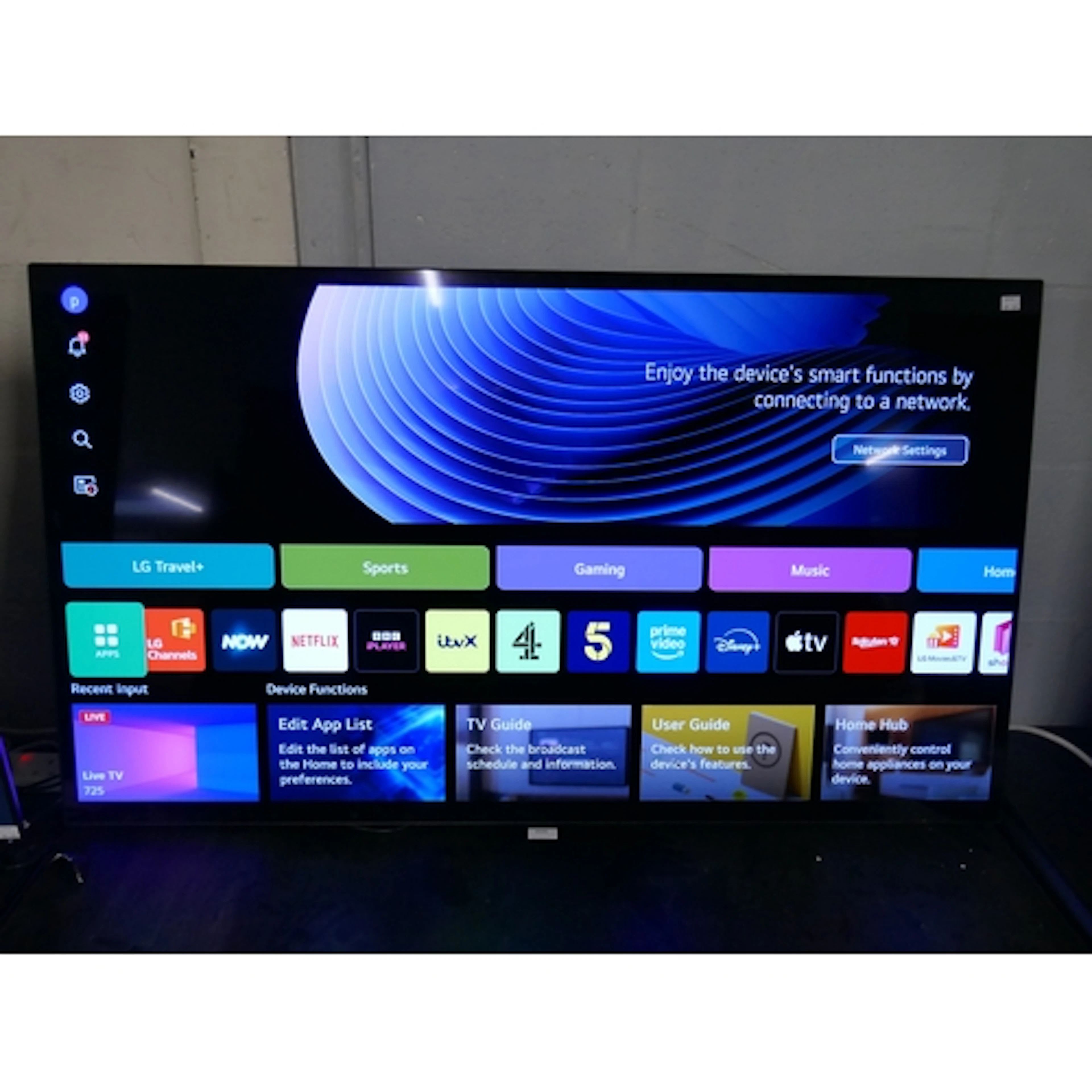 A LG 55" OLED 4K UHD Television with remote ( no stand), or...