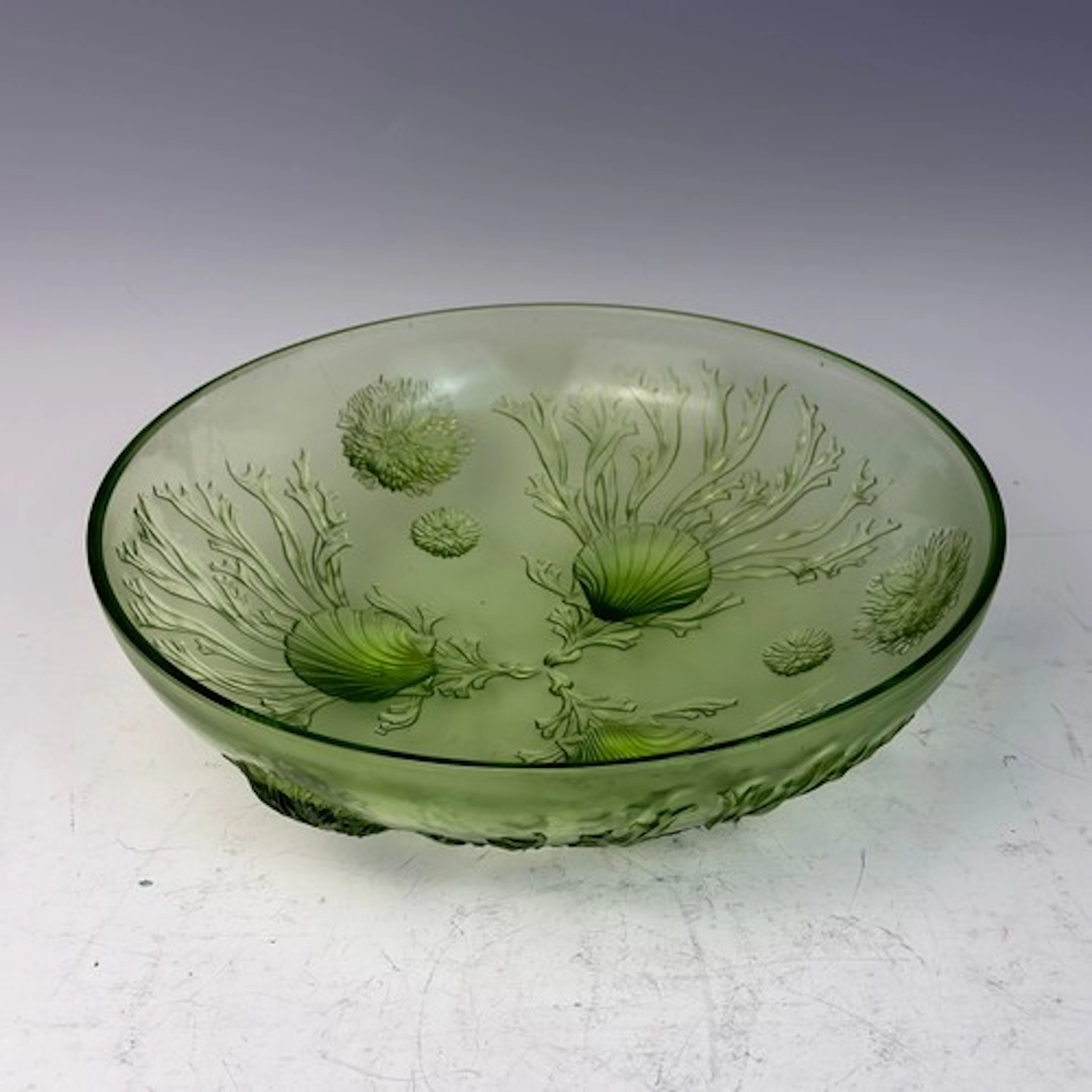 A Sabino style uranium footed glass Bowl, decorated in relie...