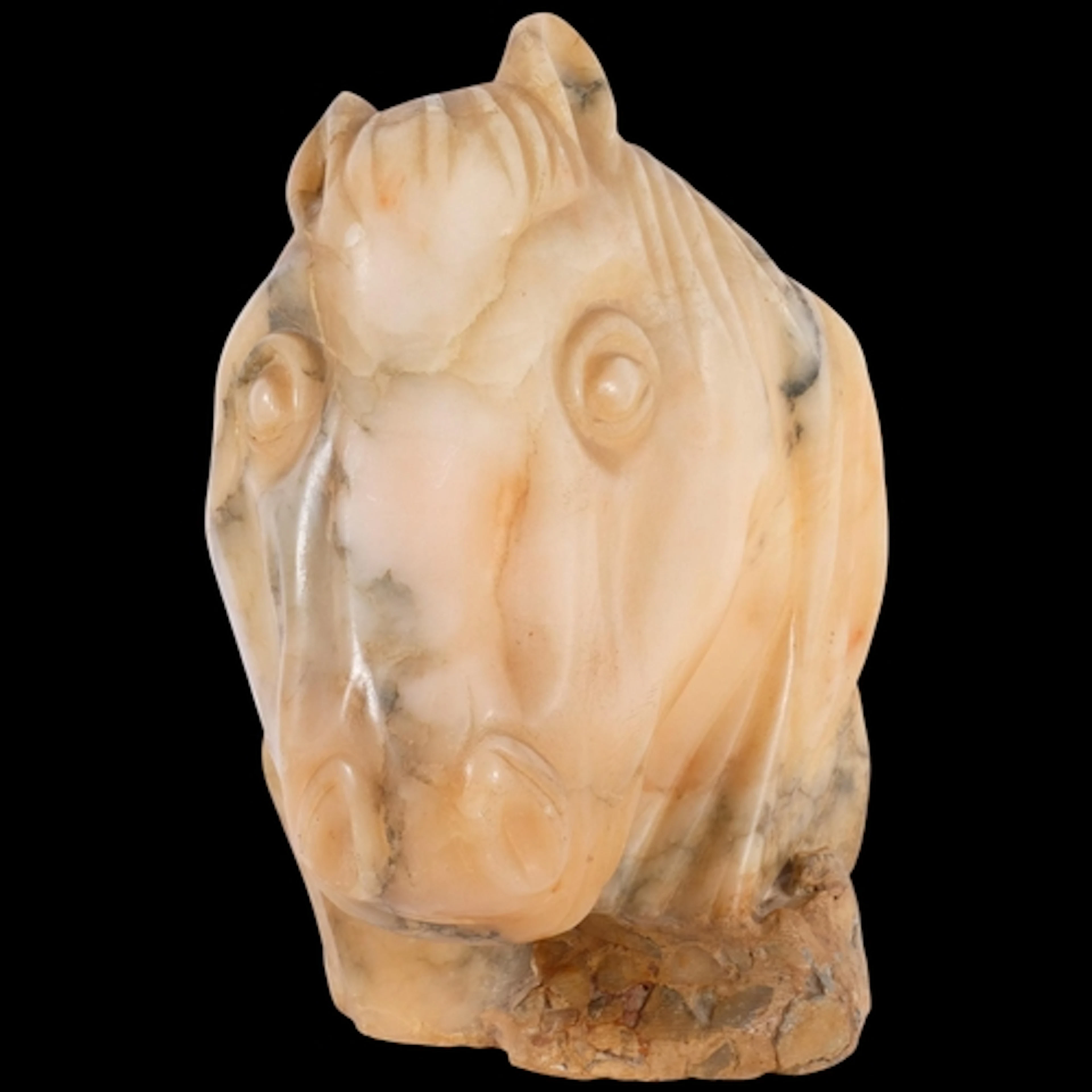 A visually life-like alabaster sculpture of a horse's head, ...