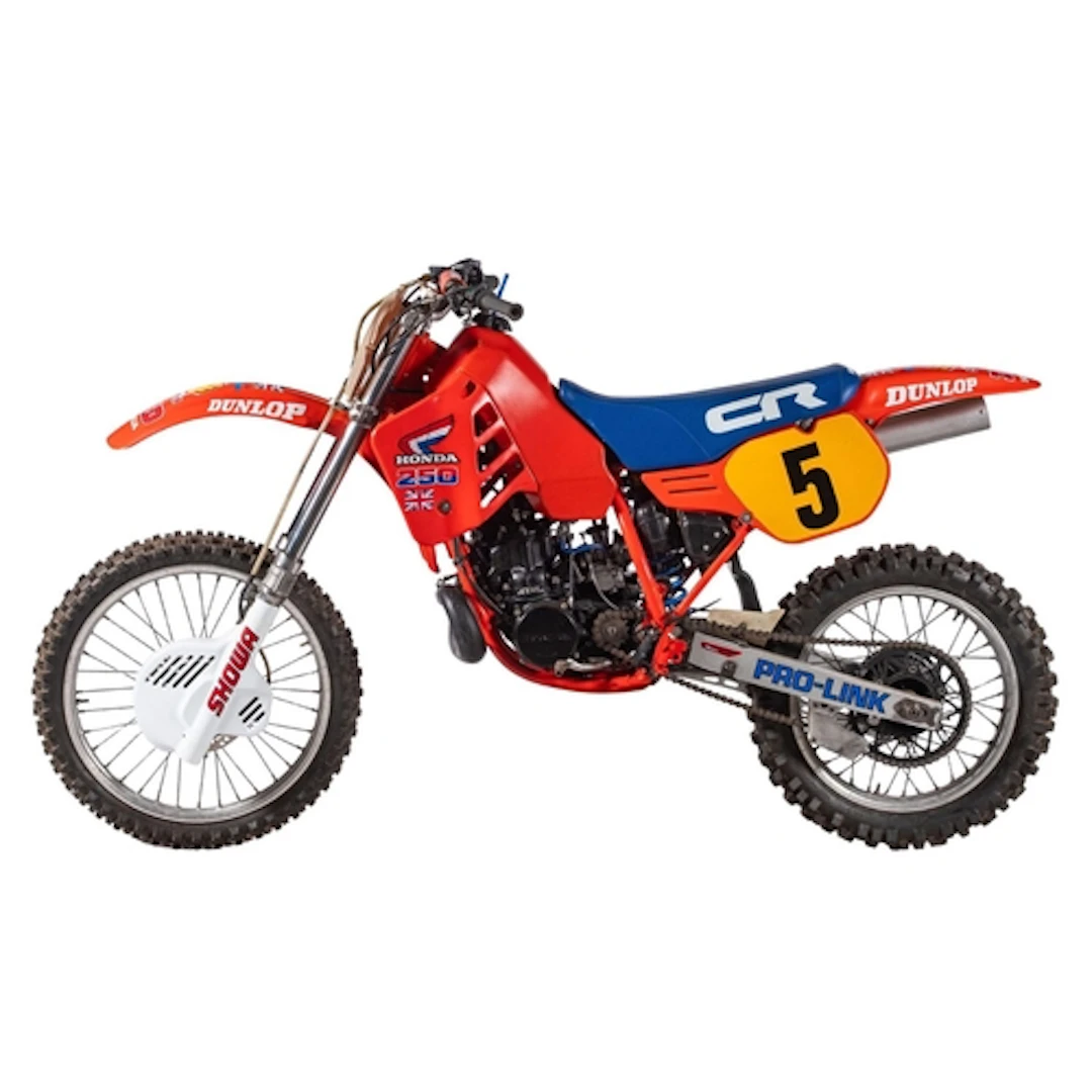 Honda CR250, 1985 red and blue, fully restored.