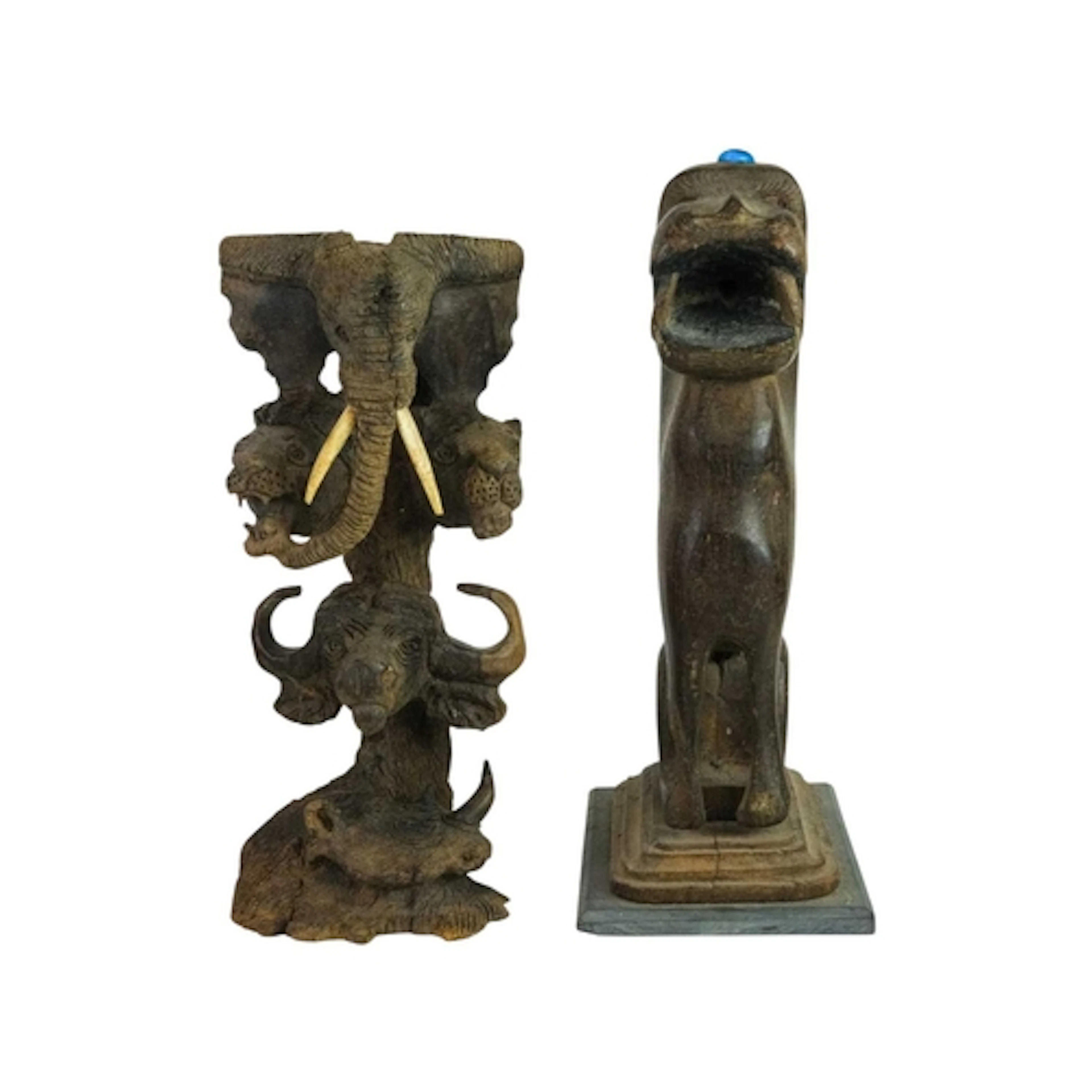 An Indian carved hardwood figure of a lion or a tiger. Late ...