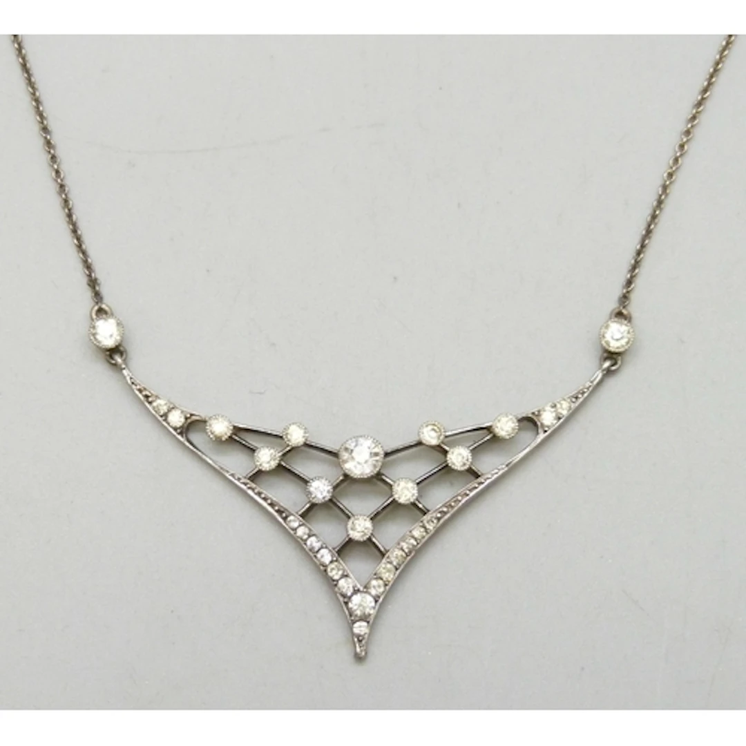 A circa 1920s/30s Art Deco white metal necklace set with pas...