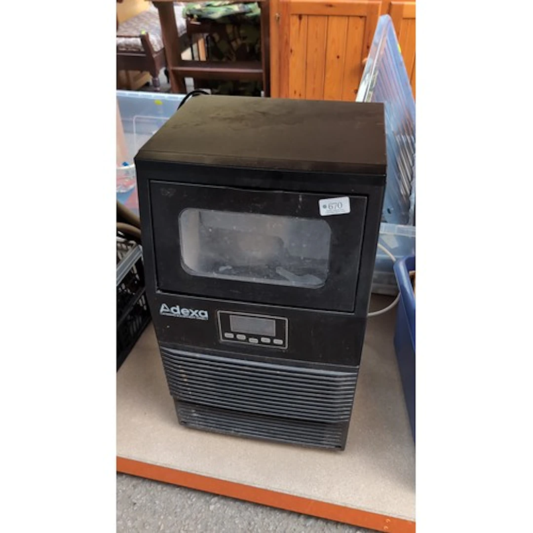 Adexa commercial ice maker in black, with a glazed drop-down...