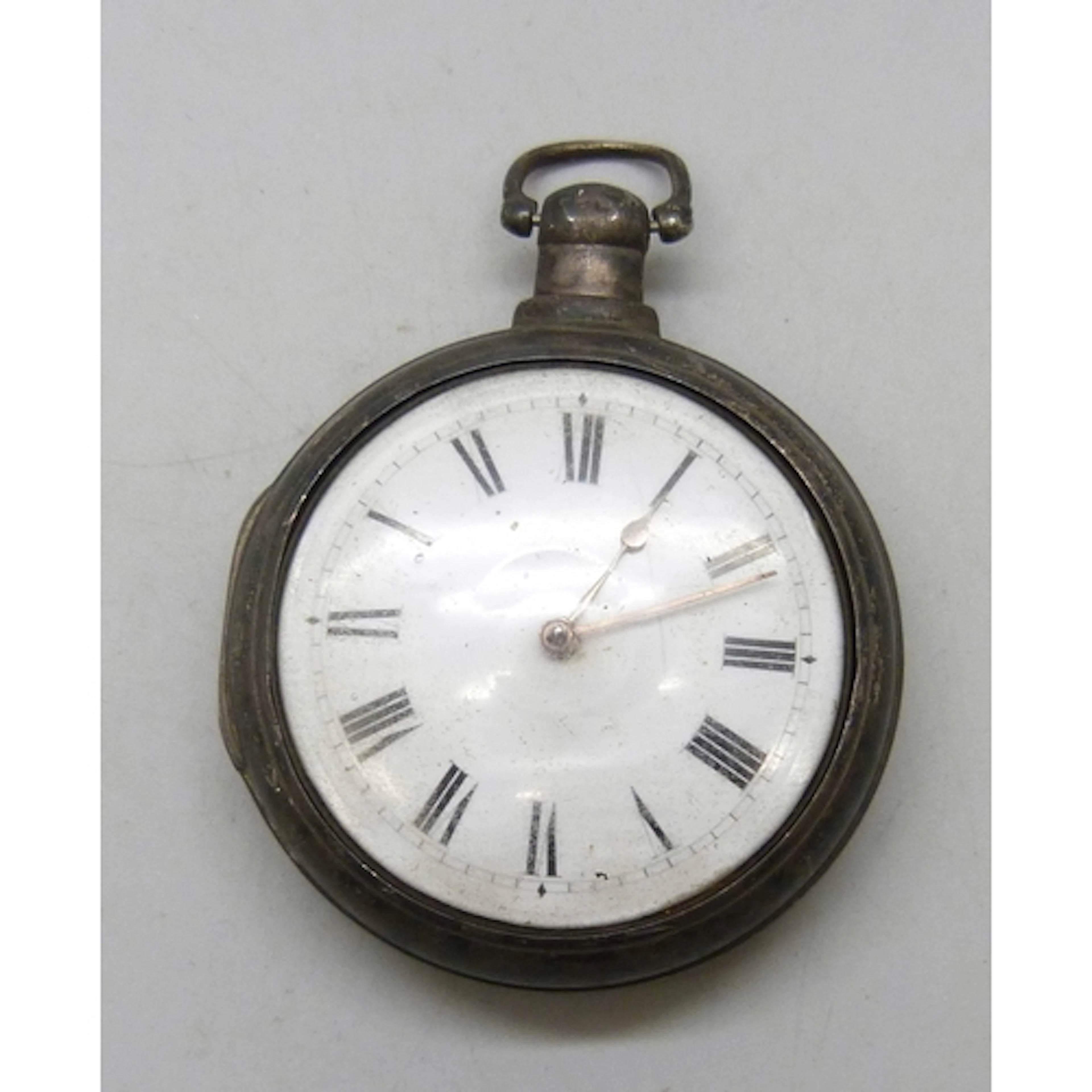 A William IV silver pair cased pocket watch, monogram to out...