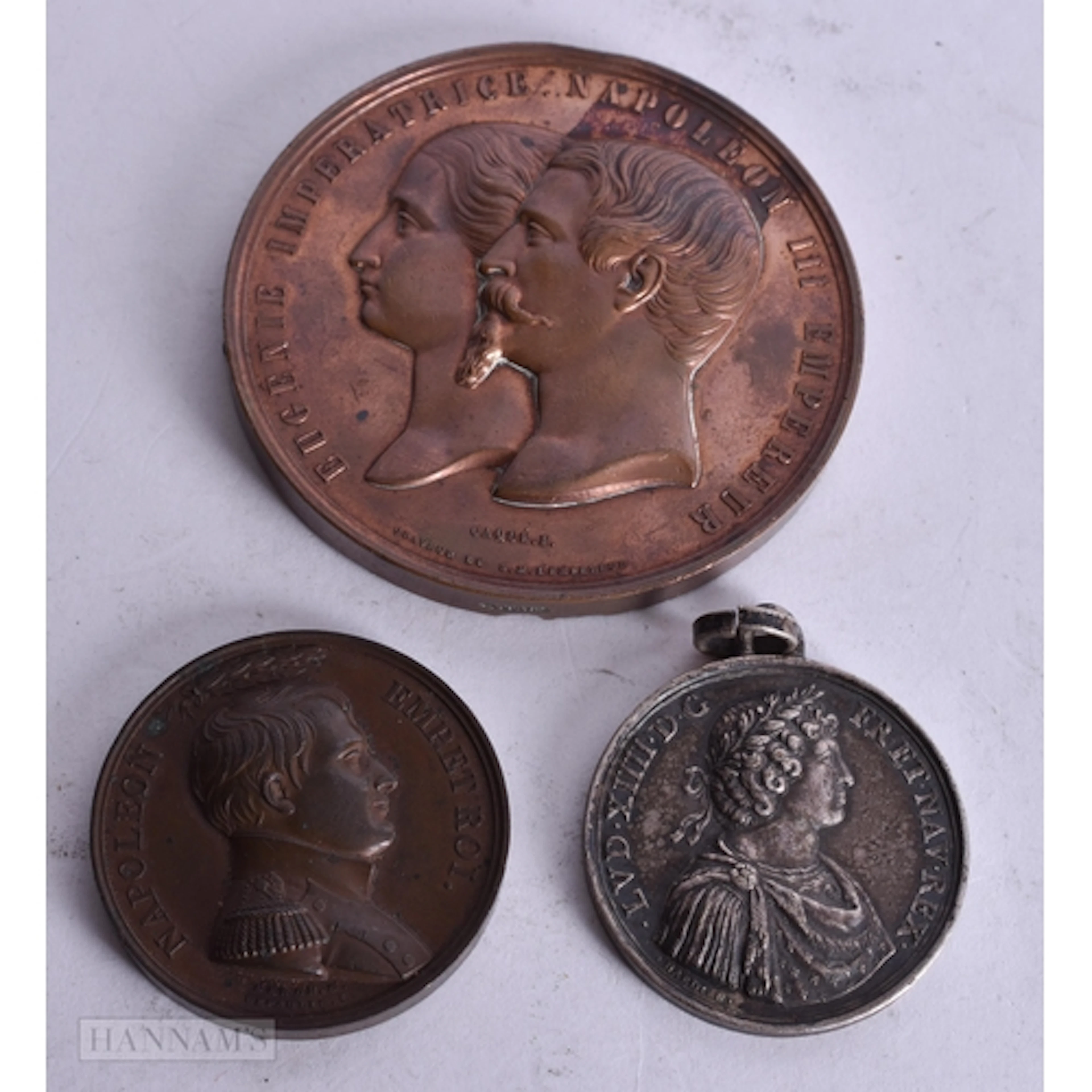 A medal depicting Napoleon III & Empress Eugenie and the Pal...