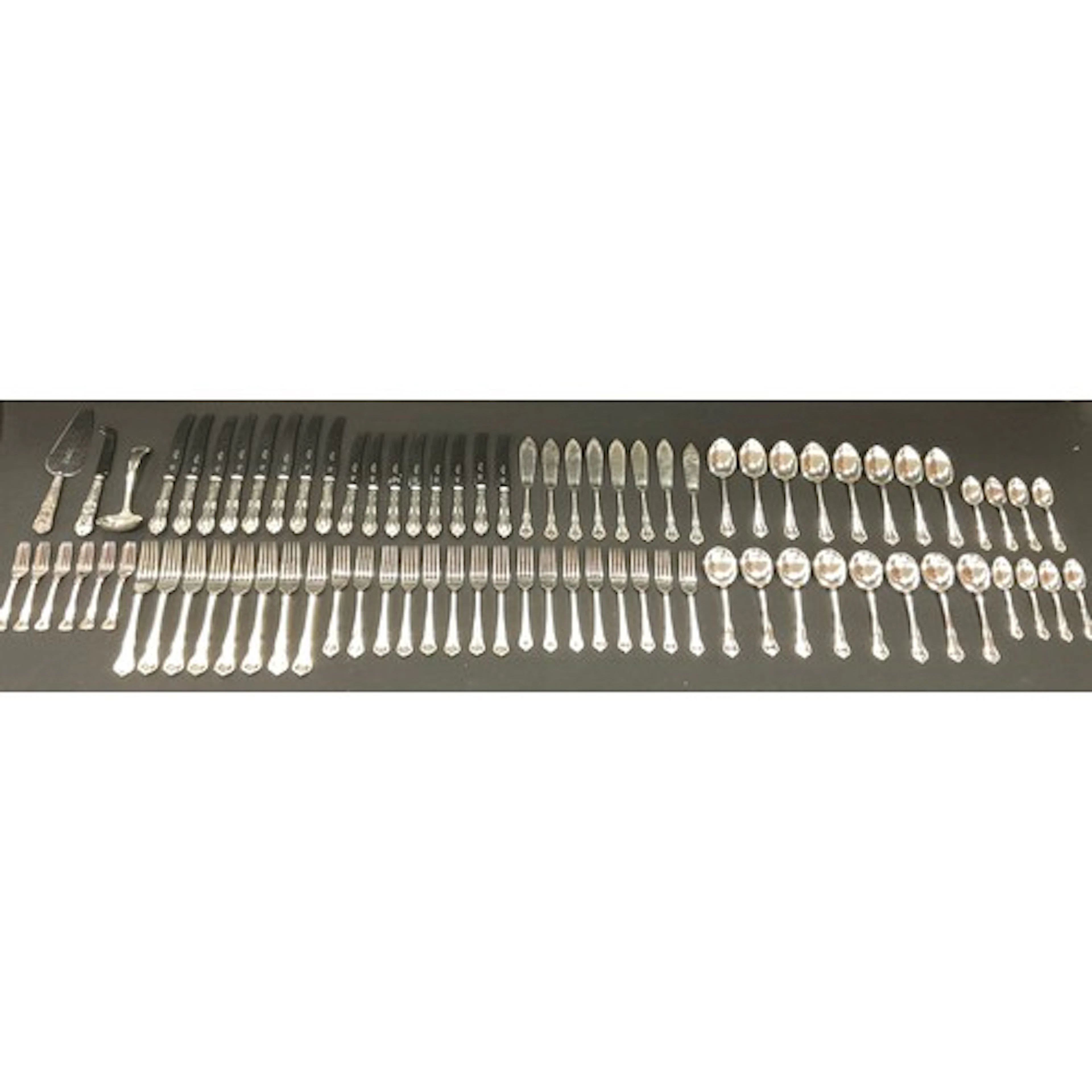 A Mappin & Webb silver plated flatware table setting for eig...