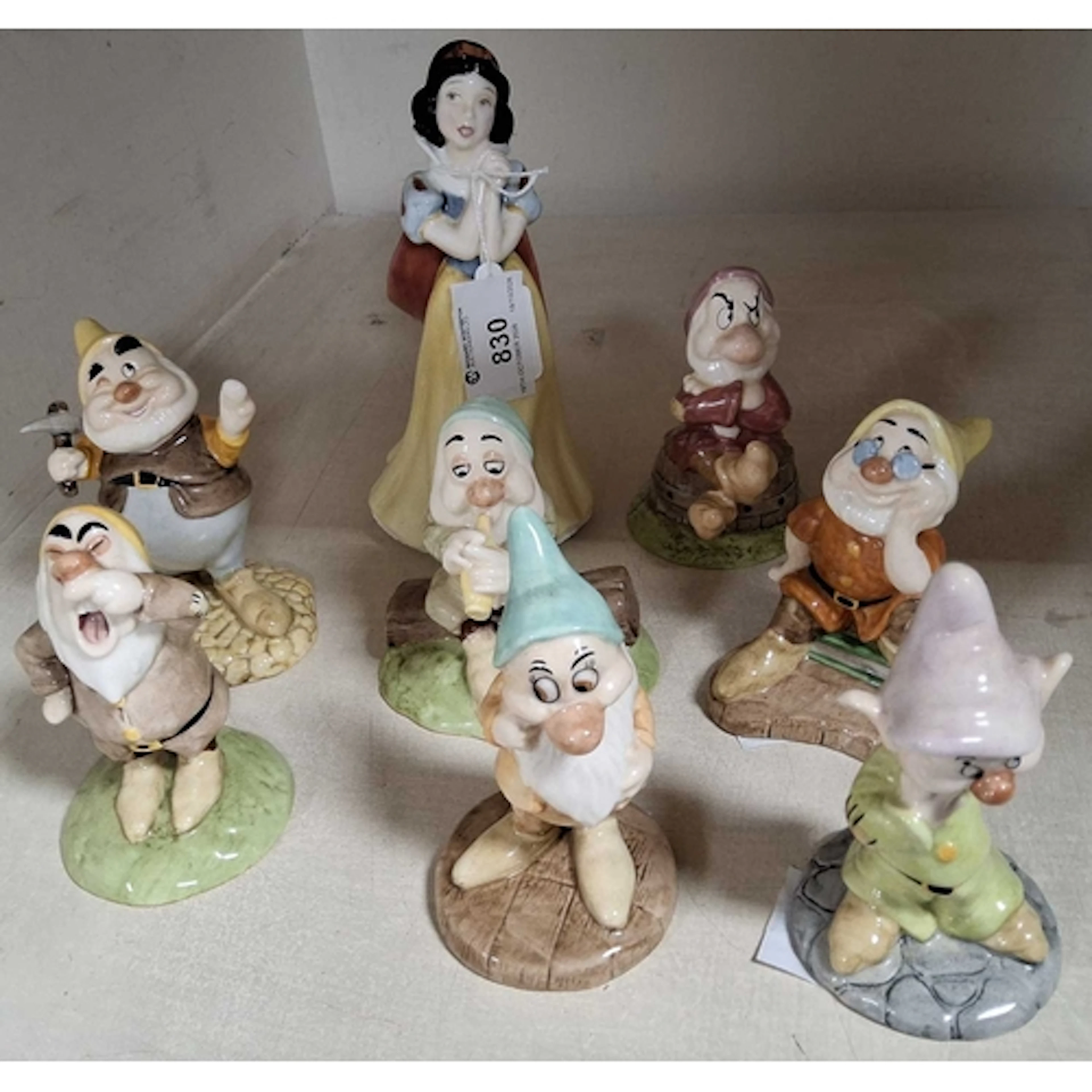 EIGHT ROYAL DOULTON DISNEY'S 'SNOW WHITE AND THE SEVEN DWARF...