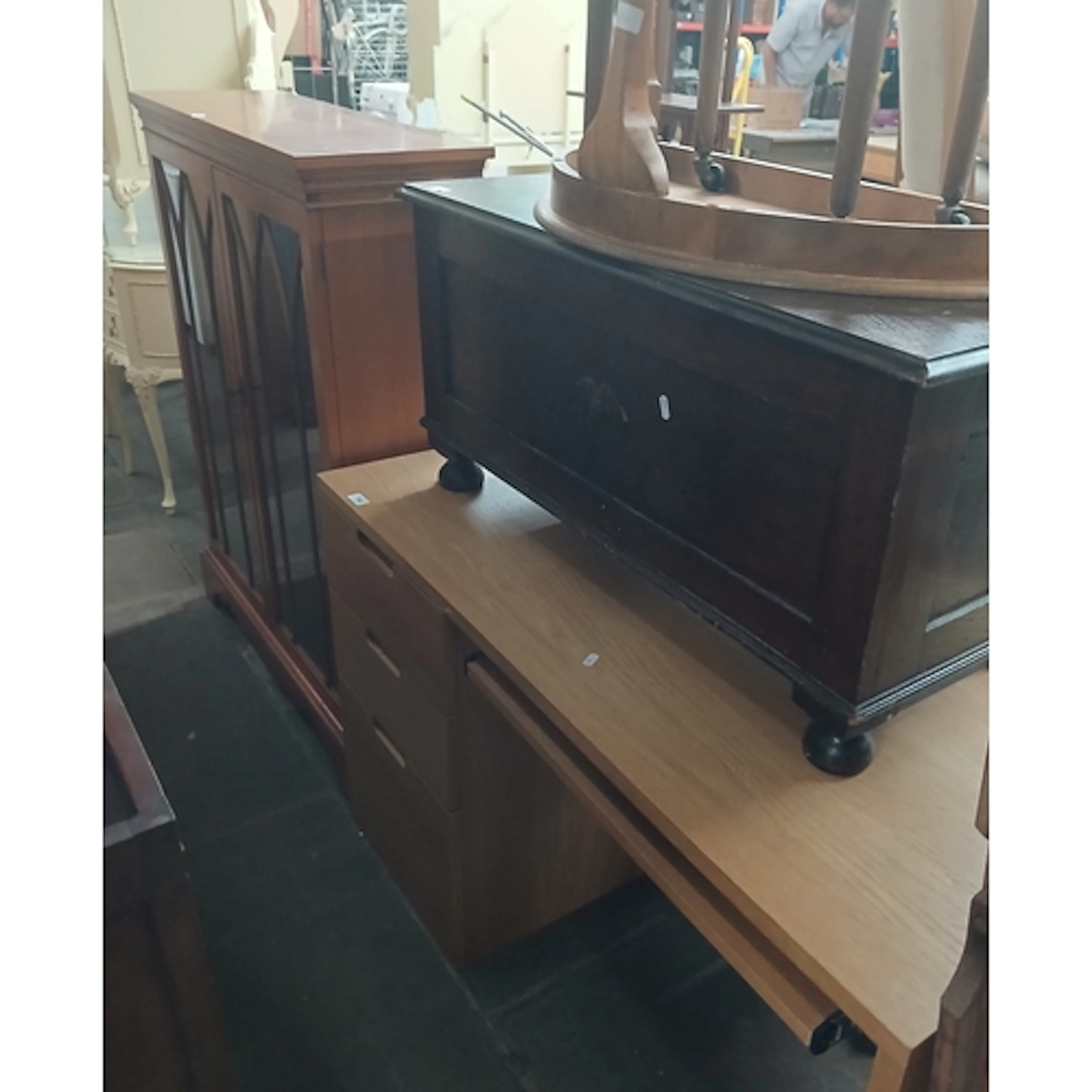 A mixed lot comprising a modern light wood veneer desk, two ...