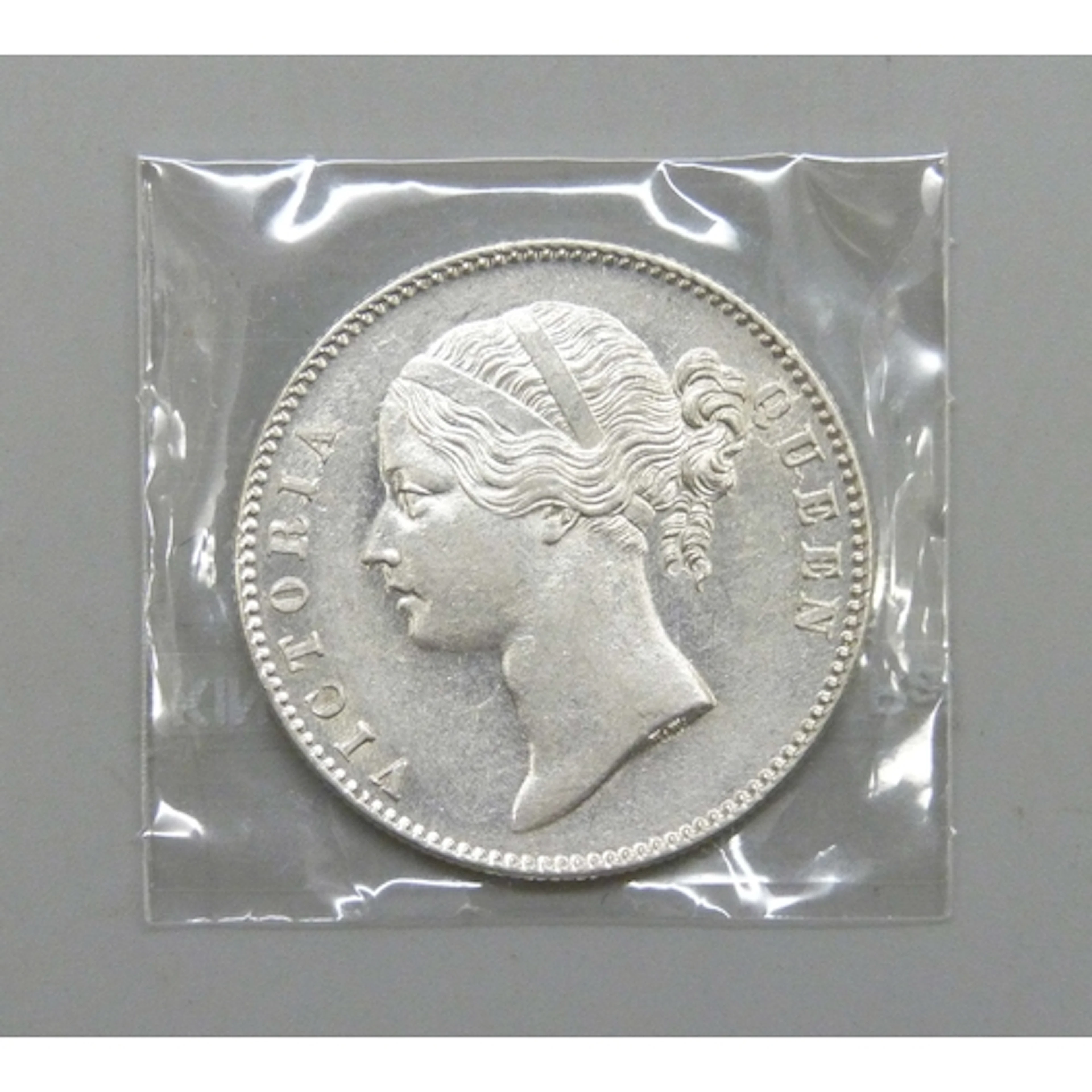 Coins - a Victorian 1840 Indian one rupee, uncirculated