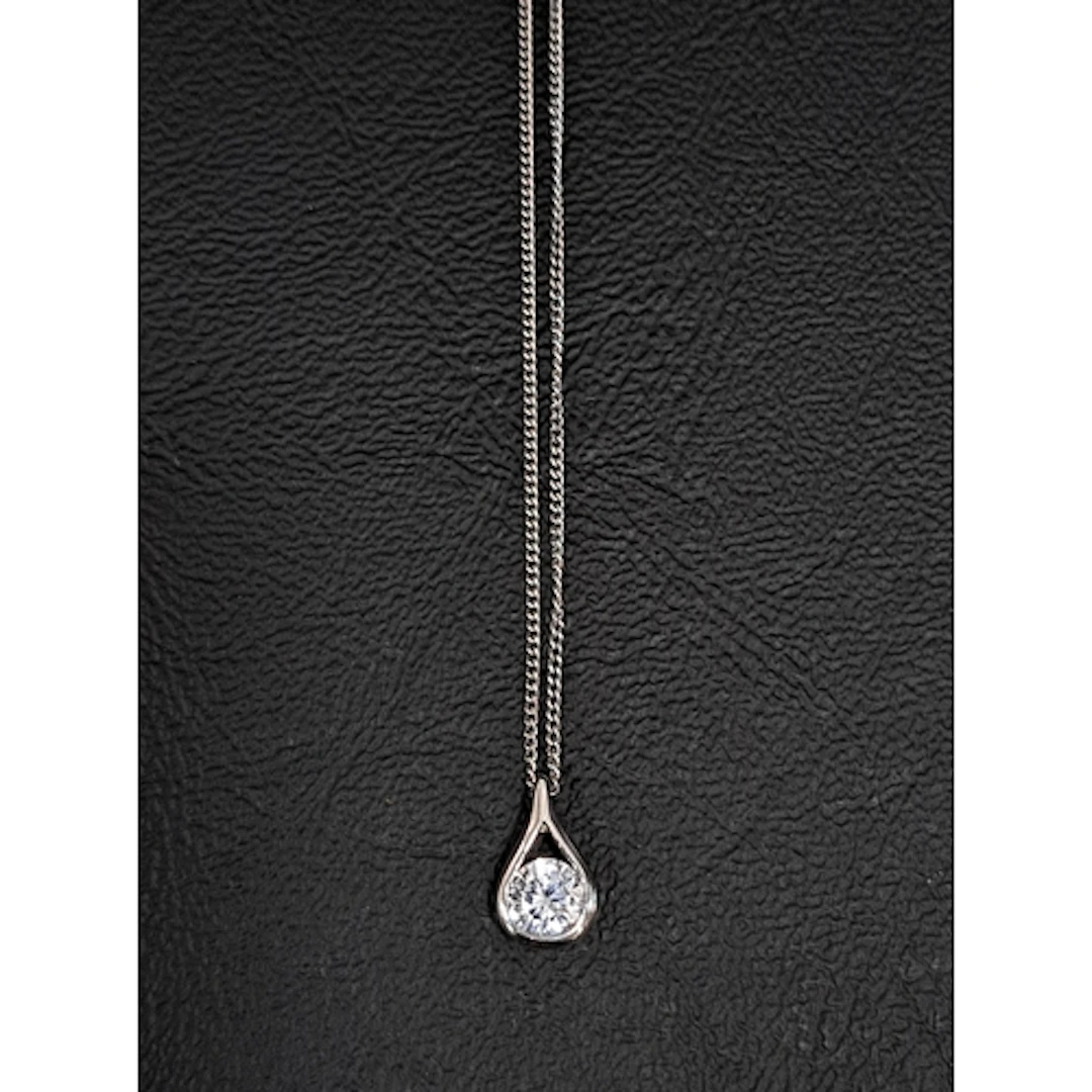 CZ SET NINE CARAT WHITE GOLD PENDANT on nine carat white gol...