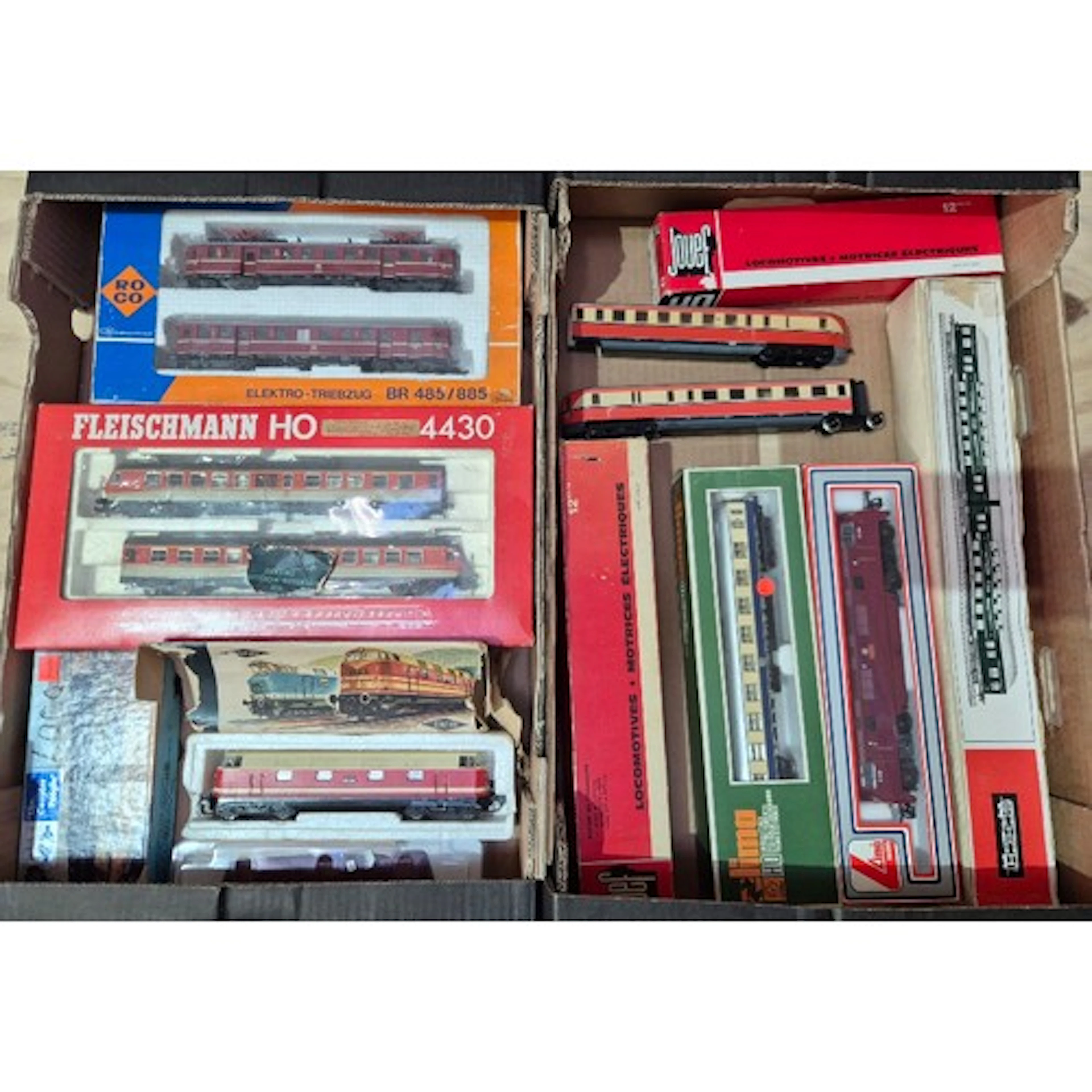 Two boxes of assorted model train items to include Fleischma...