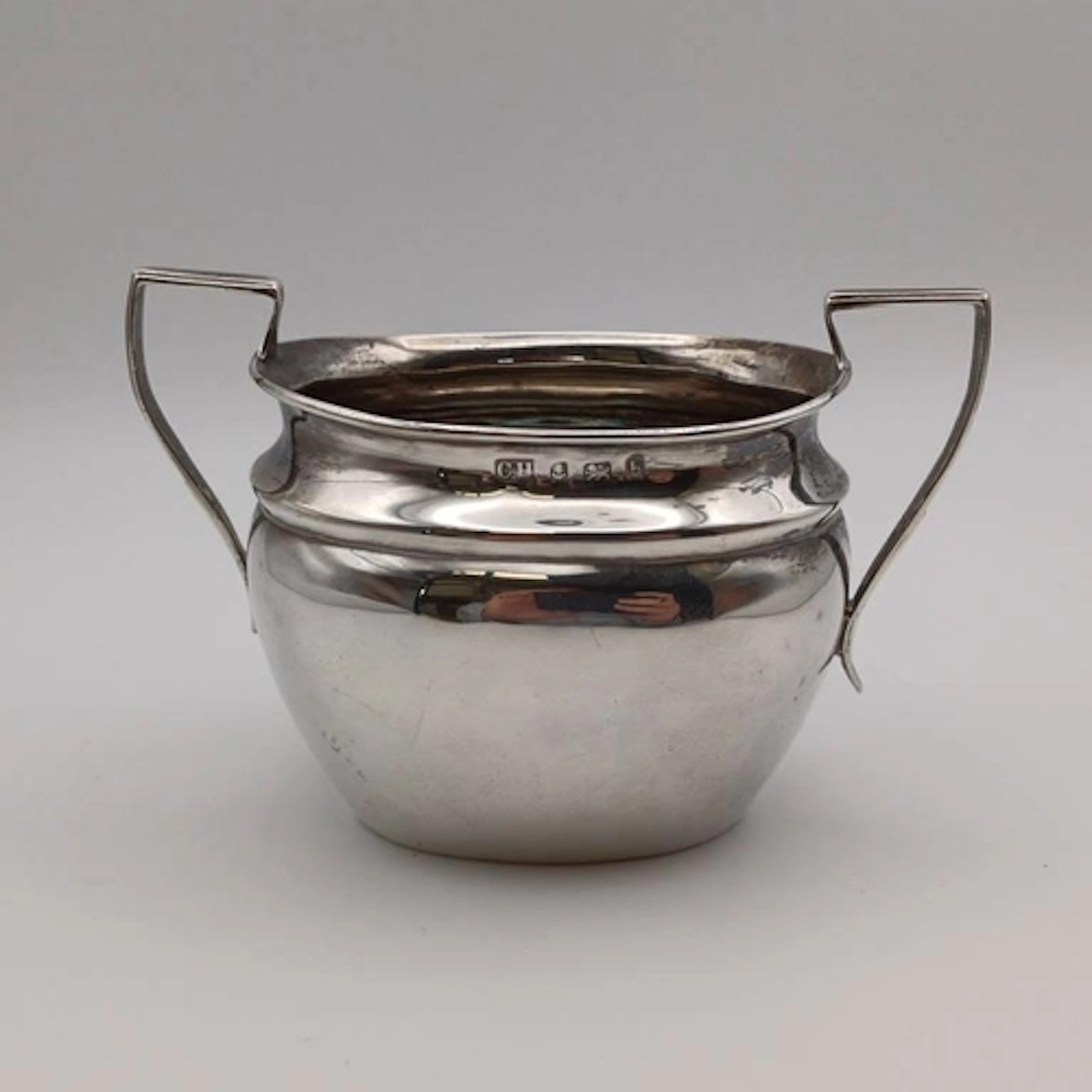 A SILVER 2 HANDLED SUGAR BOWL BY CHARLES HORNER, BIRMINGHAM...