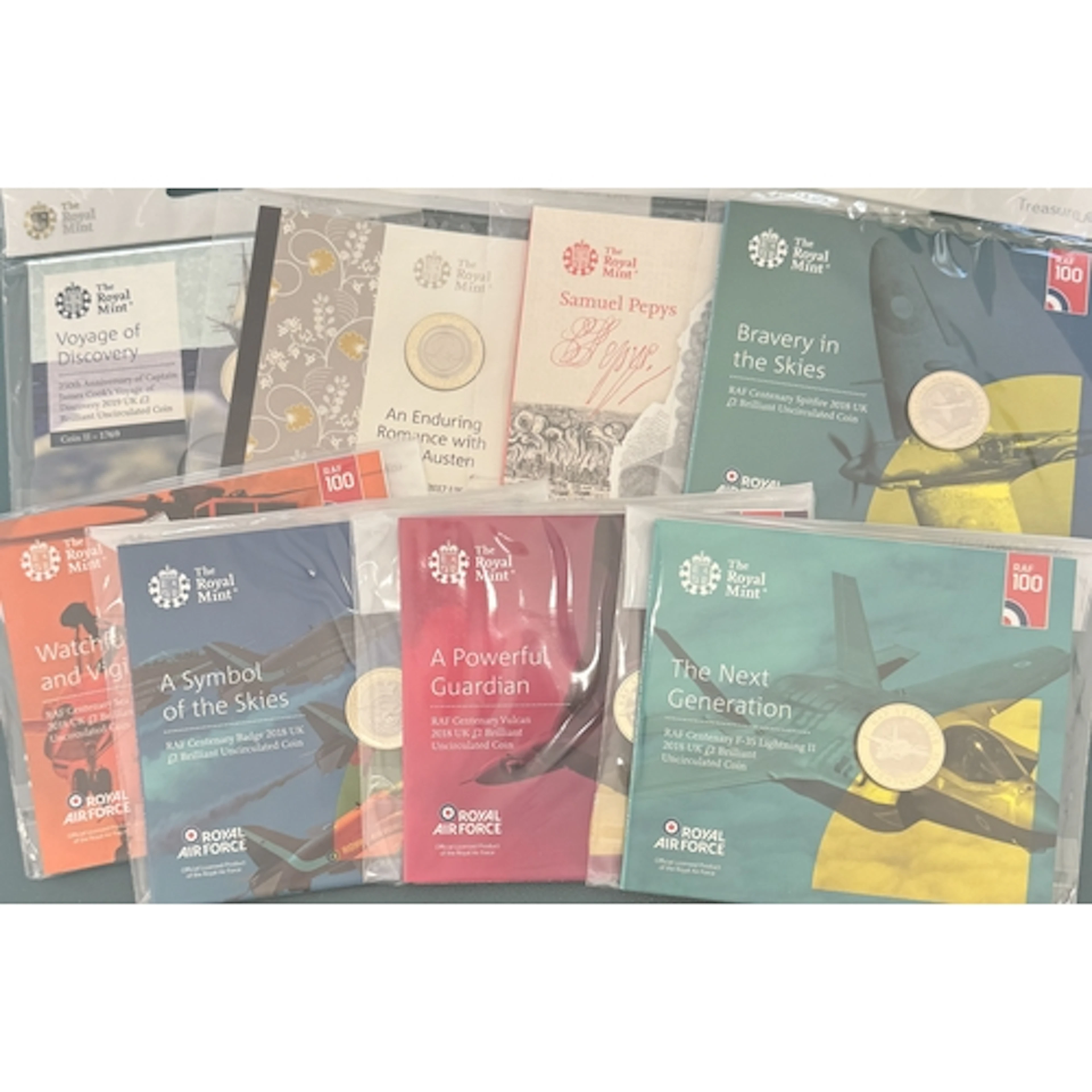 A collection of thirty-five UK Queen Elizabeth II Royal Mint...