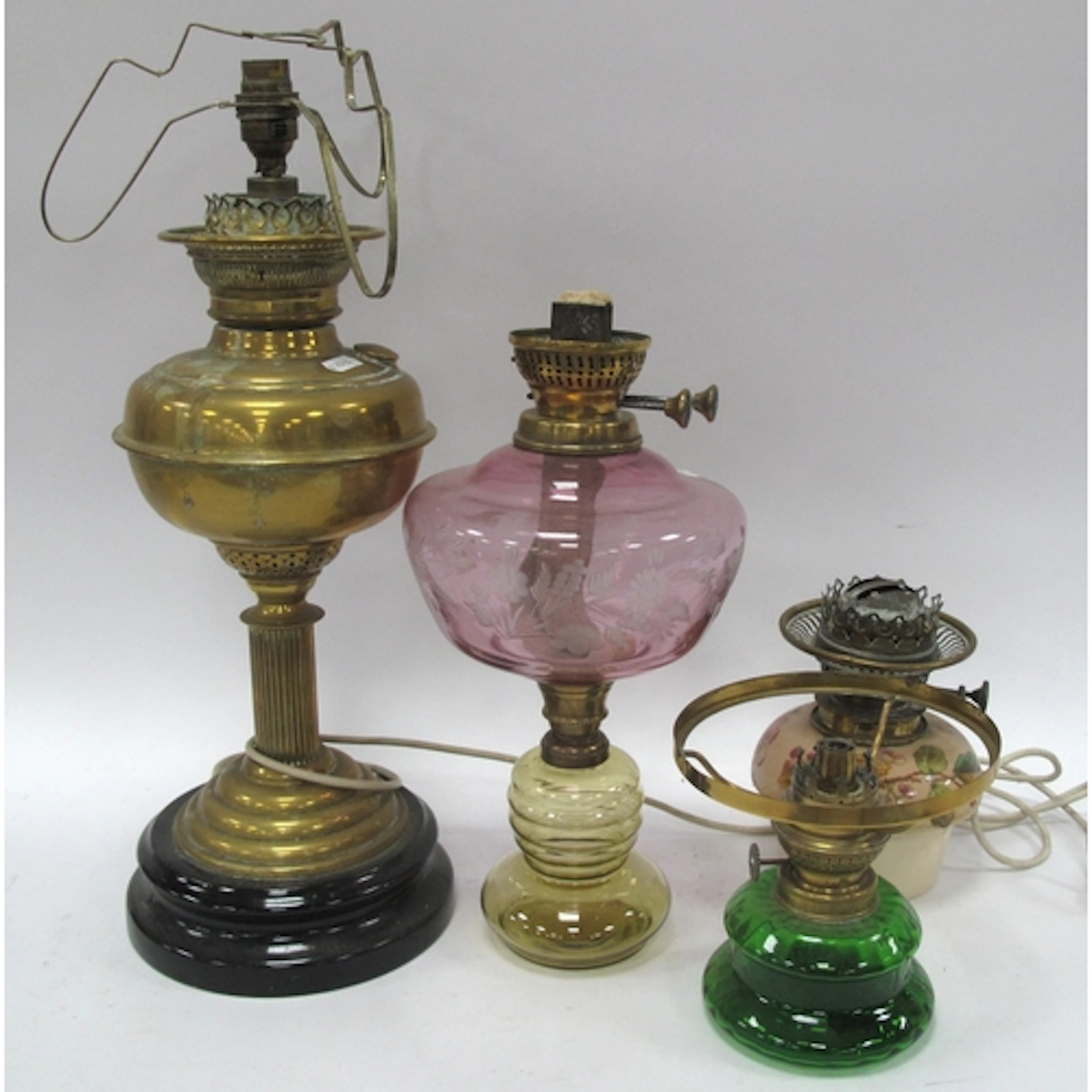 Vintage table lamps, including a brass oil lamp converted fo...
