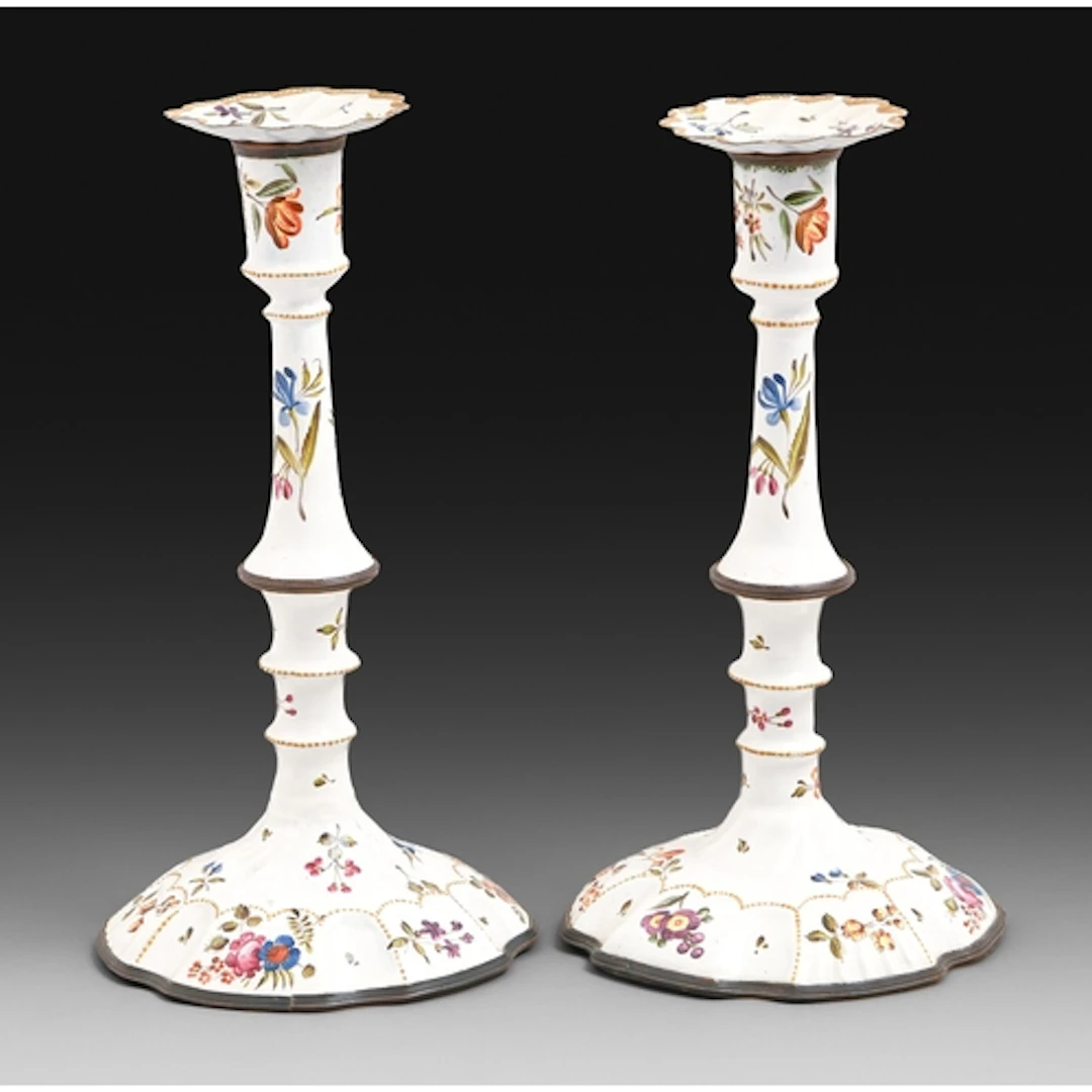 A pair of South Staffordshire enamel candlesticks, c1770, pa...