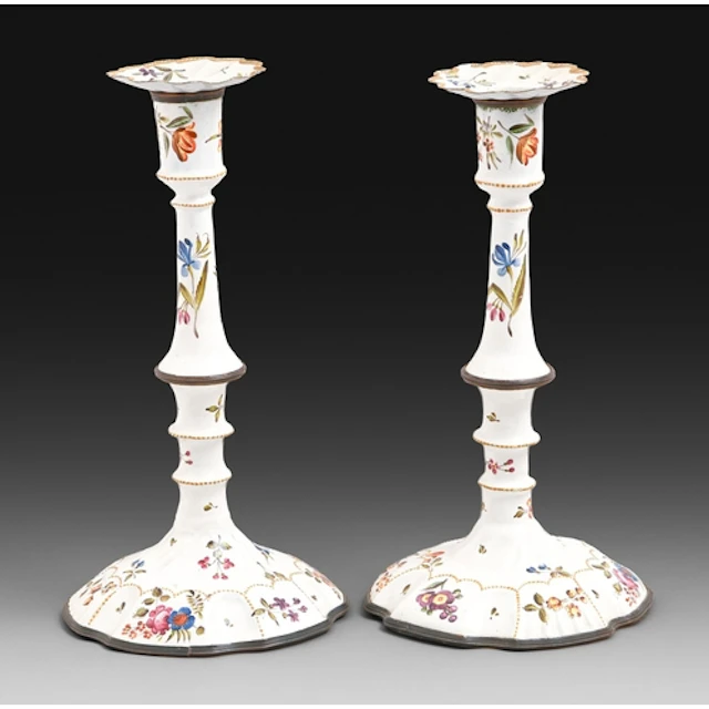 A pair of South Staffordshire enamel candlesticks, c1770, pa...