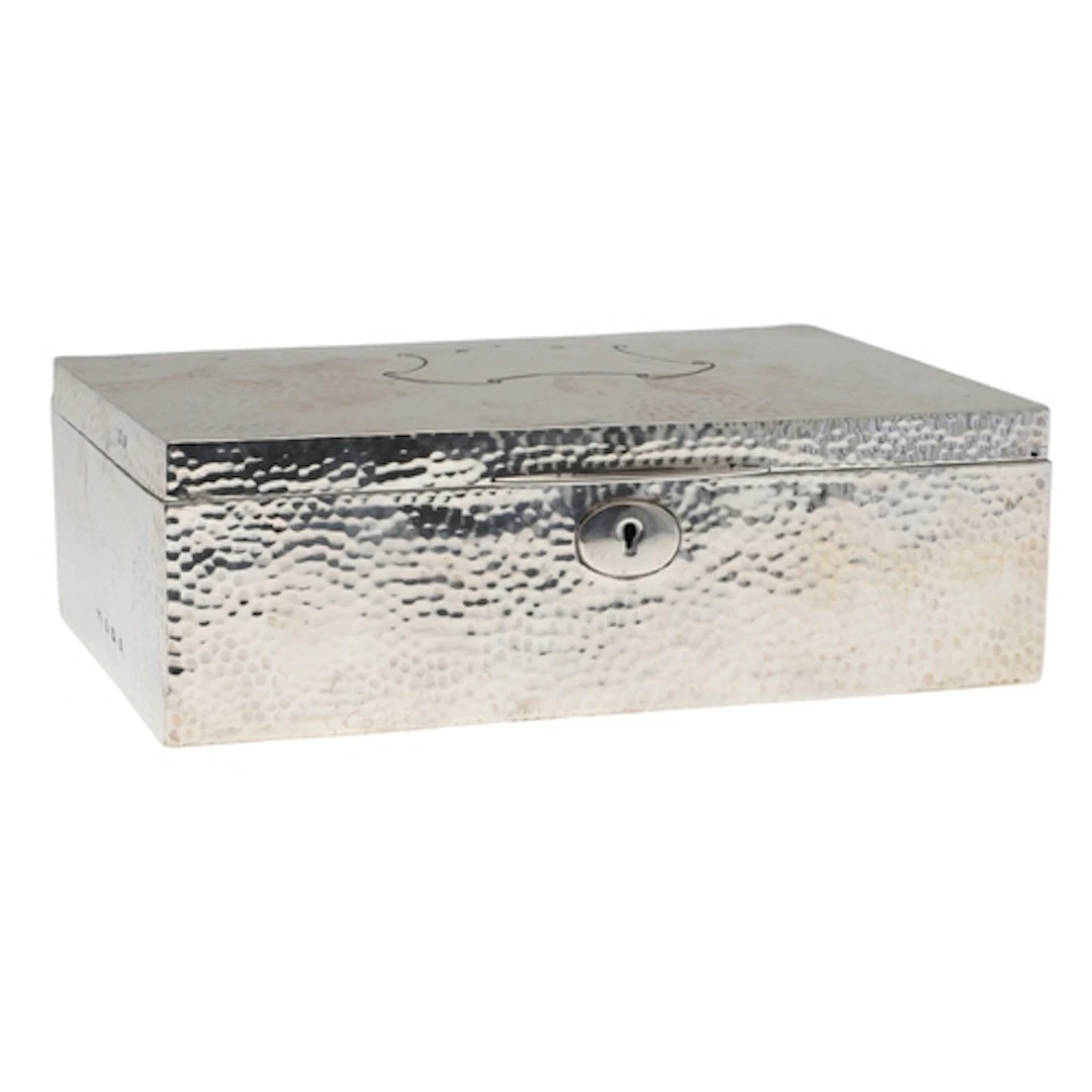 AN EDWARDIAN SILVER LOCK BOX. Of rectangular form with hamme...