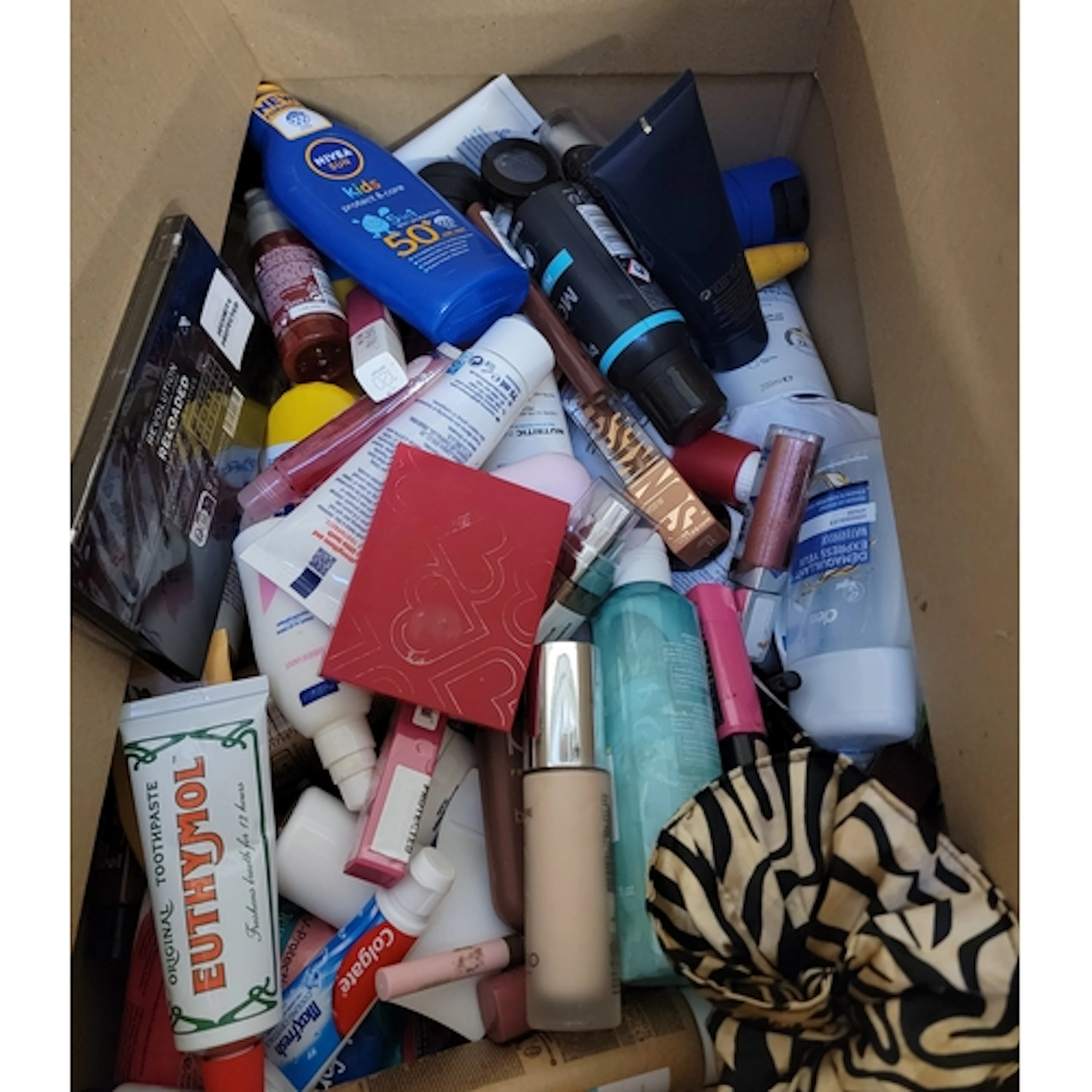 ONE BOX OF TOILETRIES AND COSMETICS including NYX, Kiko, May...