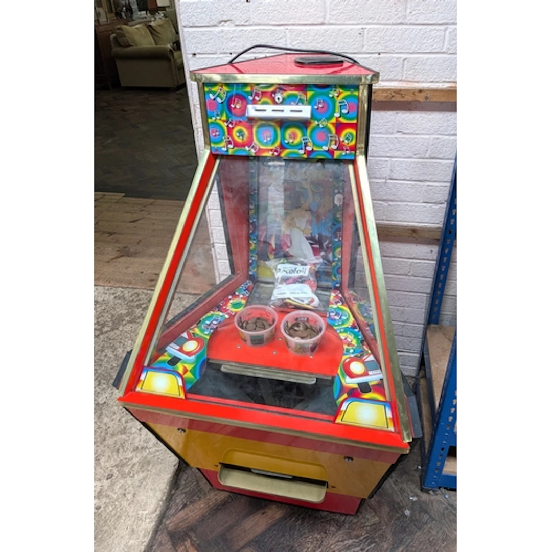 A vintage penny falls arcade game