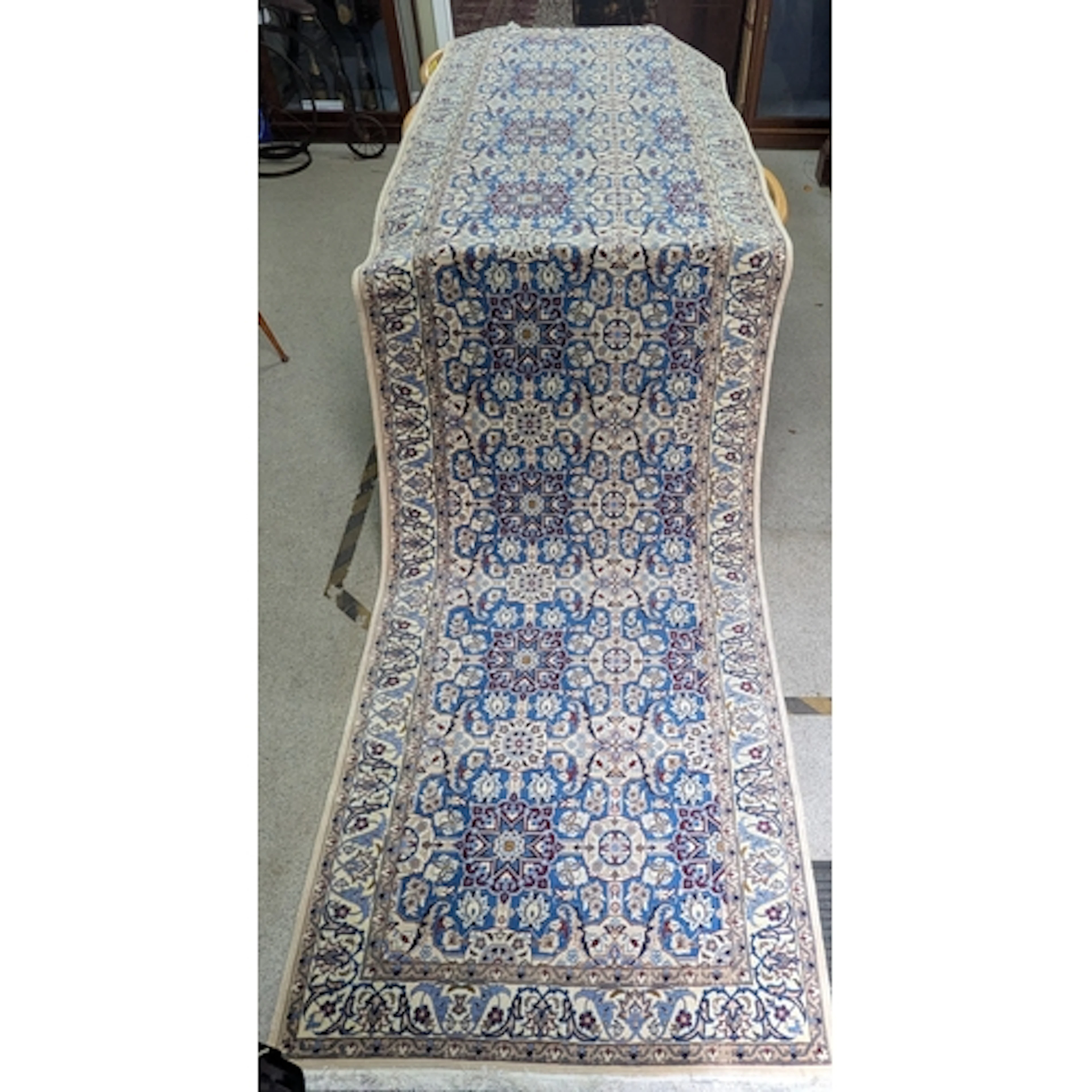 An Isfahan Persian wool and silk rug, on cream ground, flora...