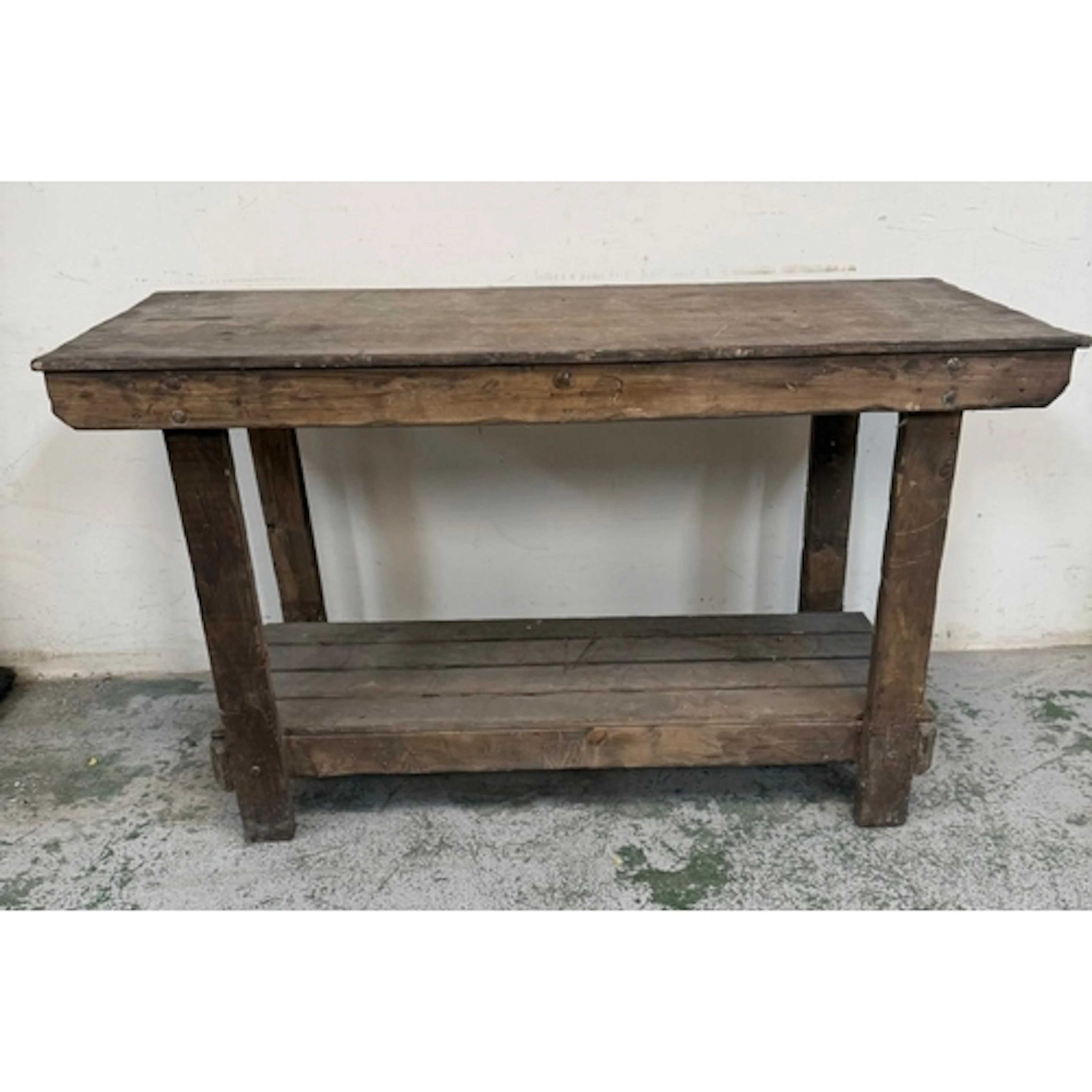 Work bench with slatted shelf under.
