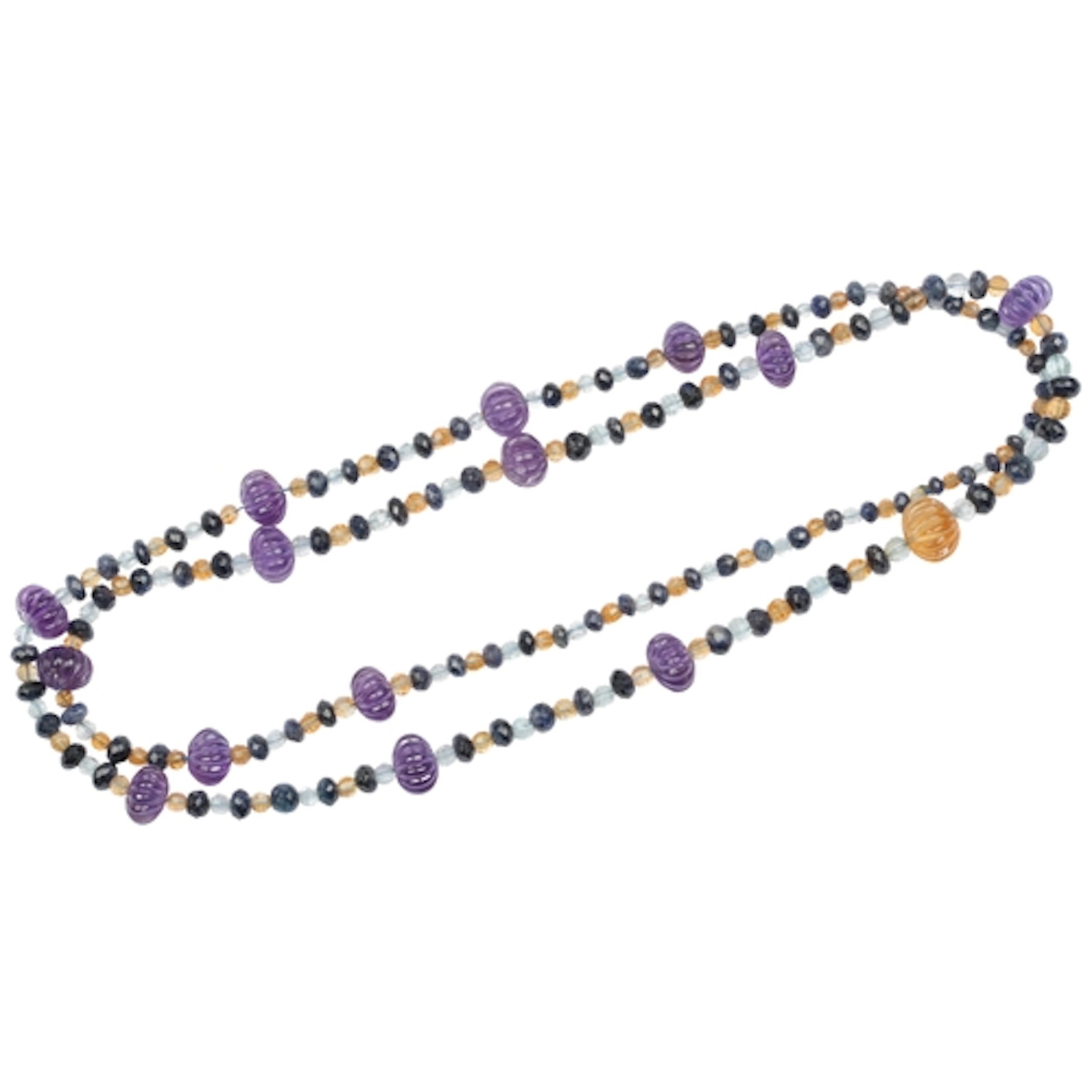 An amethyst, sapphire, aquamarine and citrine bead necklace,...
