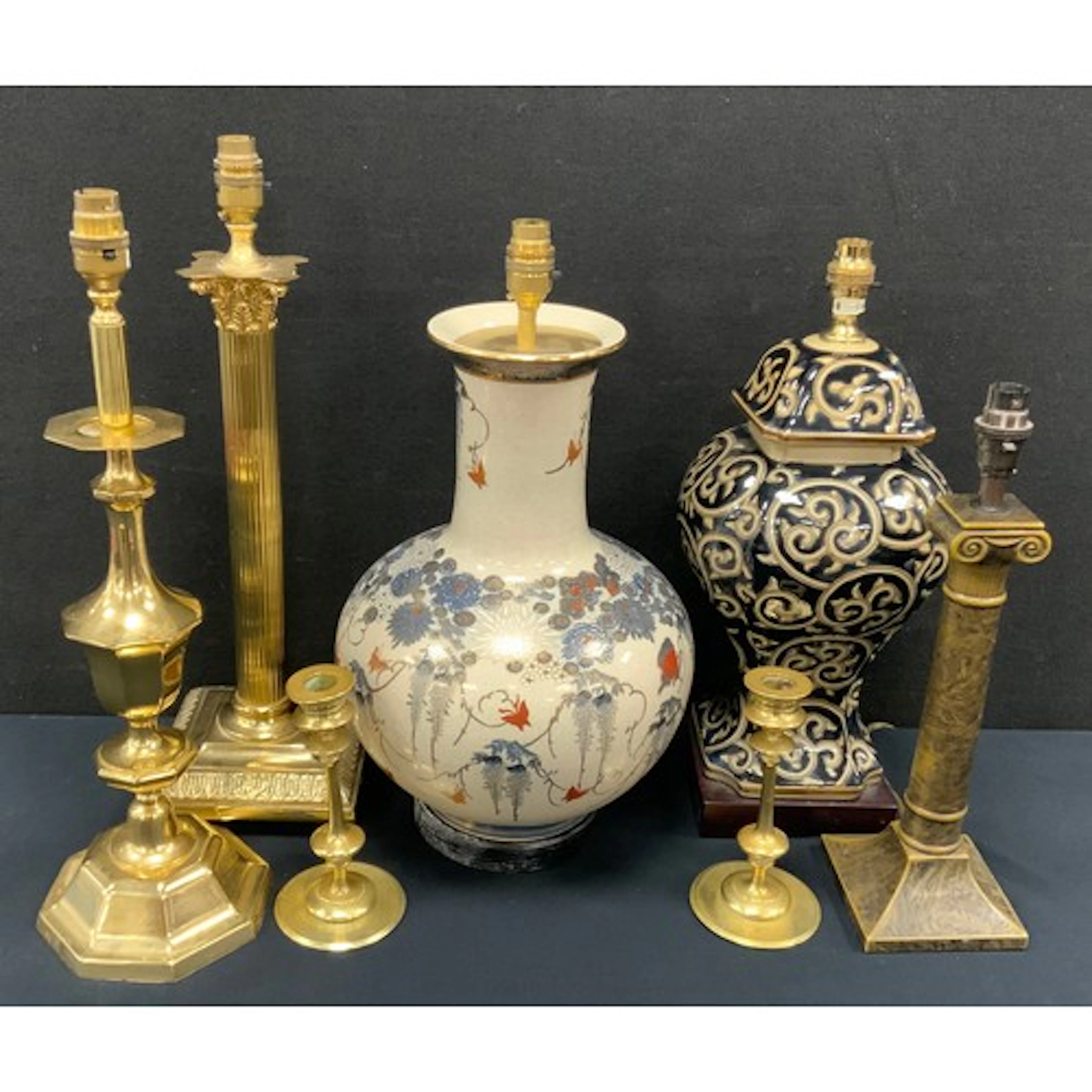Decorative lamps - a large brass table lamp in the form of a...