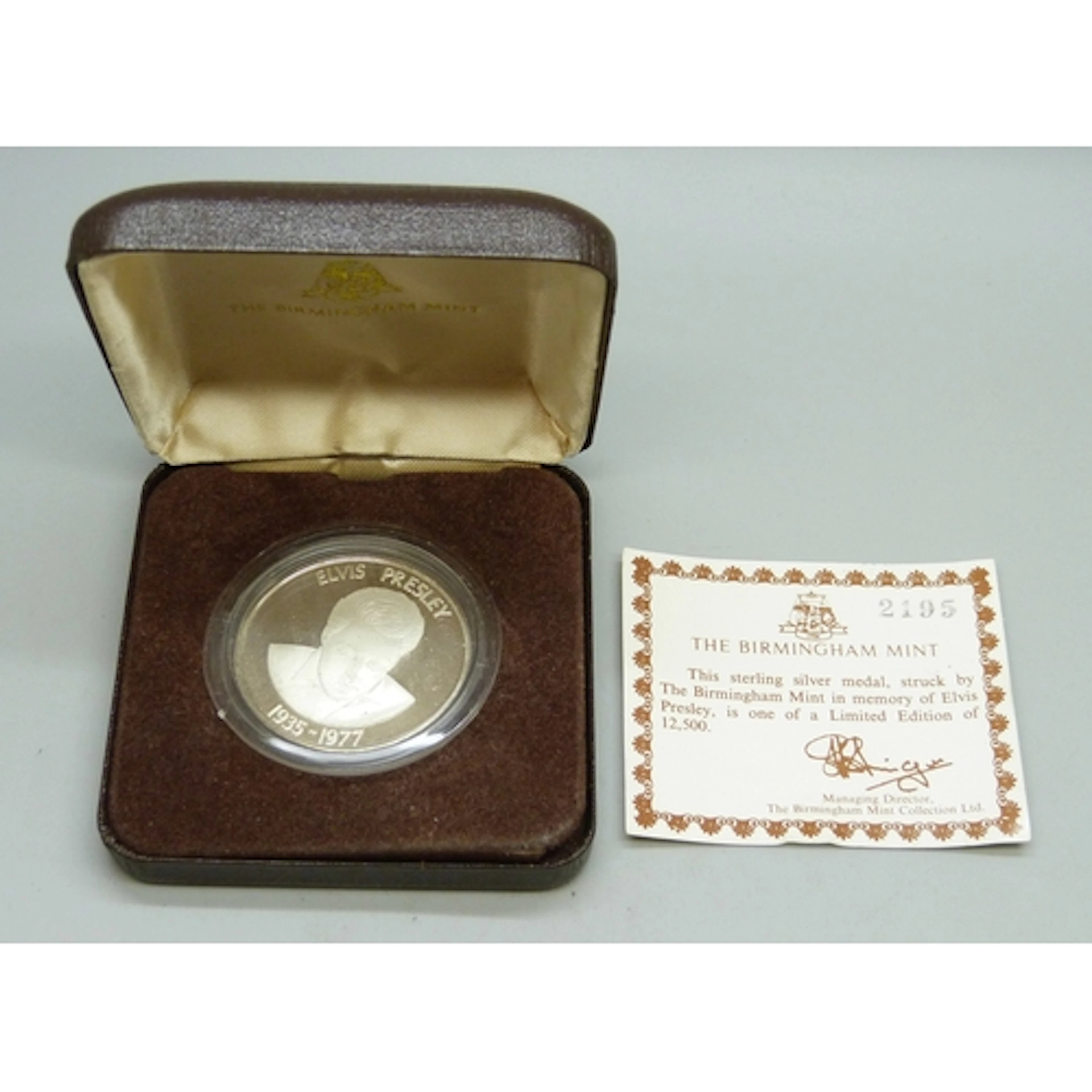 The Birmingham Mint, an Elvis Presley sterling silver commem...
