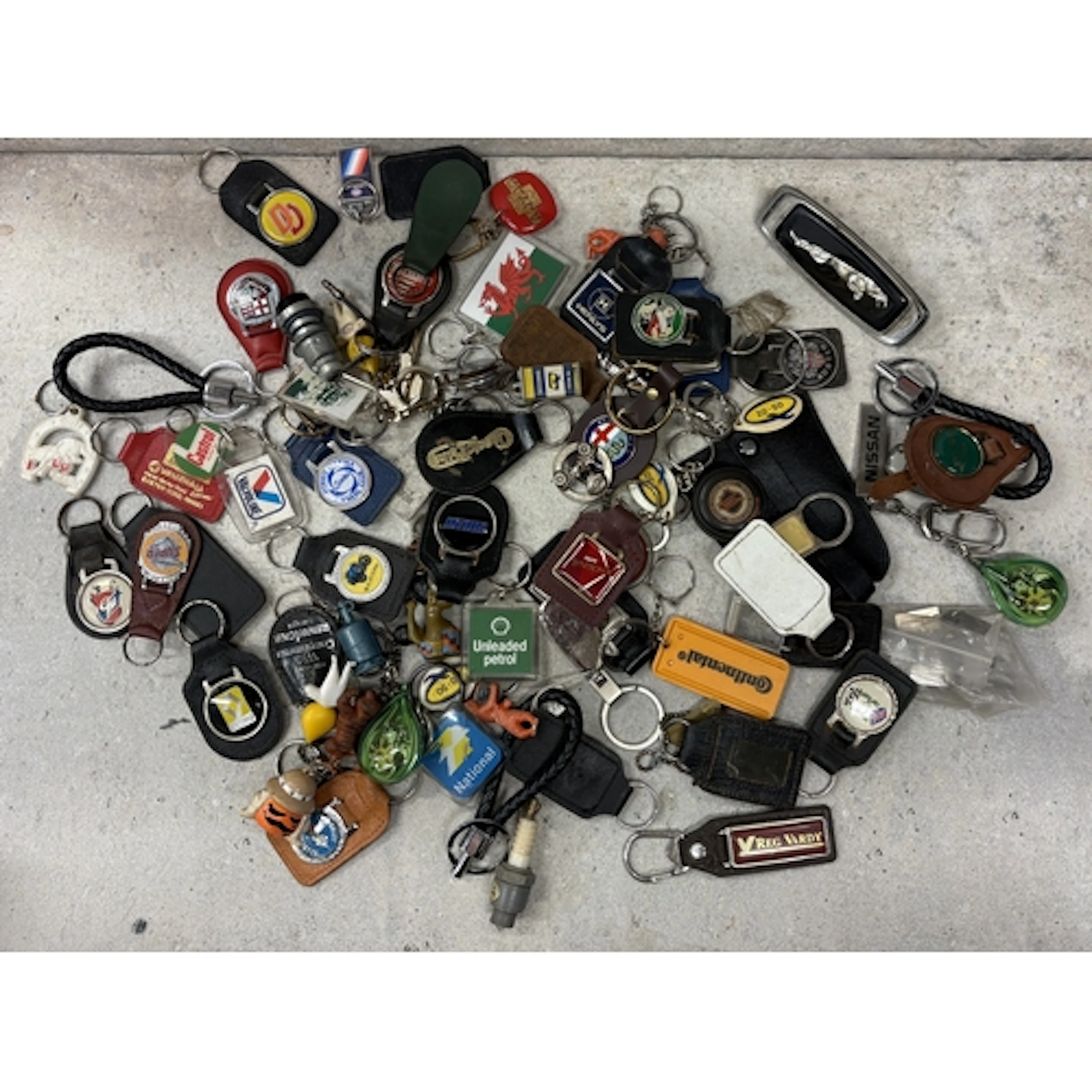 A collection of motoring related keyrings. Est. £20 - £30.