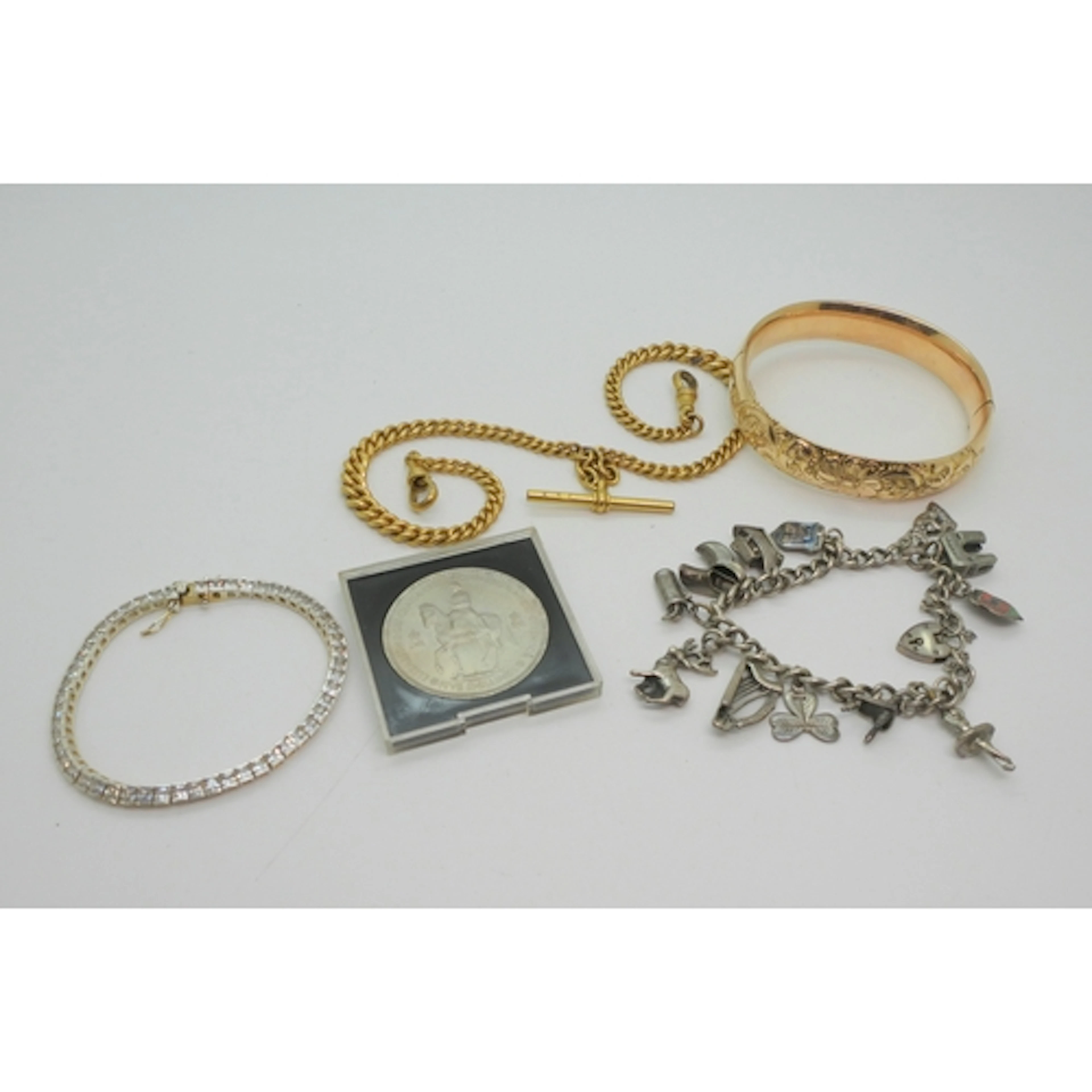 A T+H brand rolled gold double tapered fob chain, a rolled g...