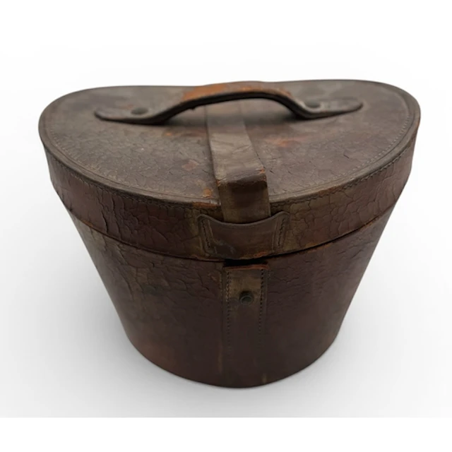 A 19TH CENTURY LINCOLN BENNETT TOP HAT IN ORIGINAL LEATHER B...