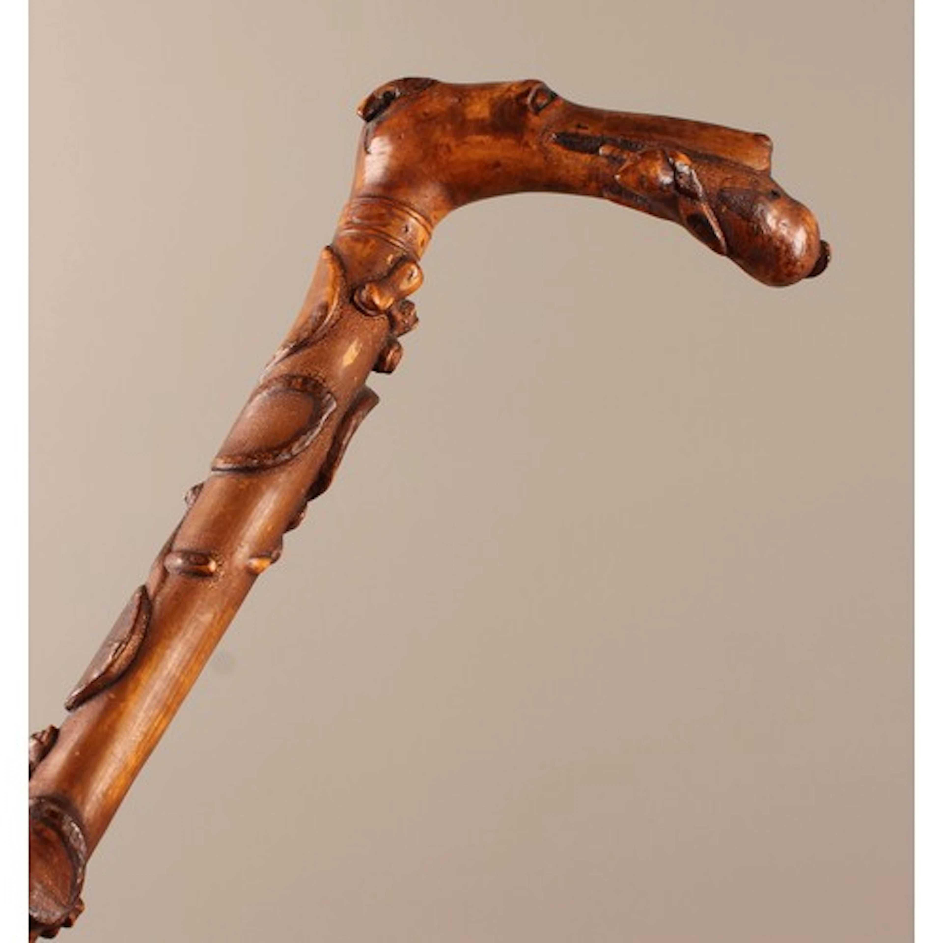 Folk Art - a 19th century fruitwood walking stick, the handl...