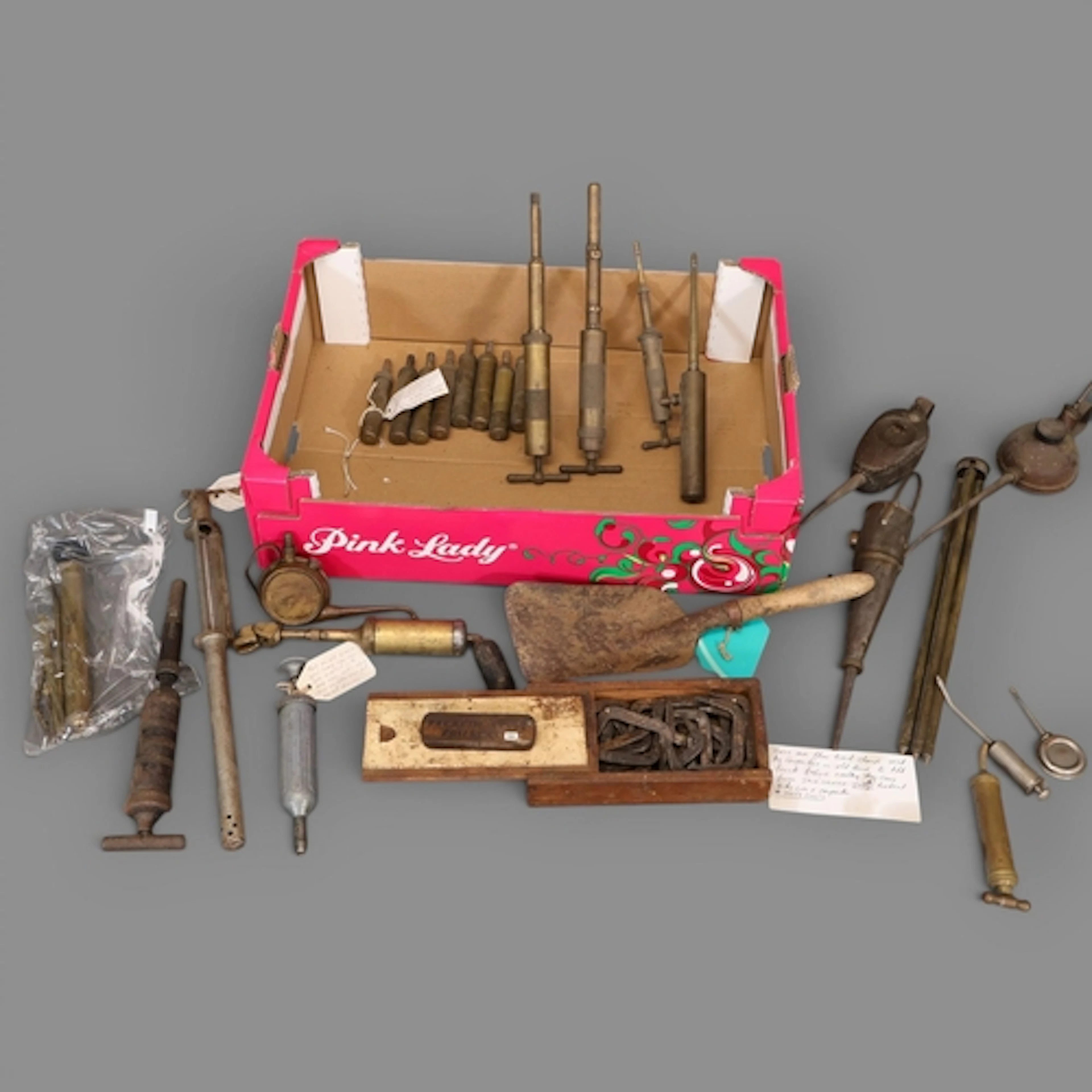 A selection of antique and vintage hand tools to include flo...