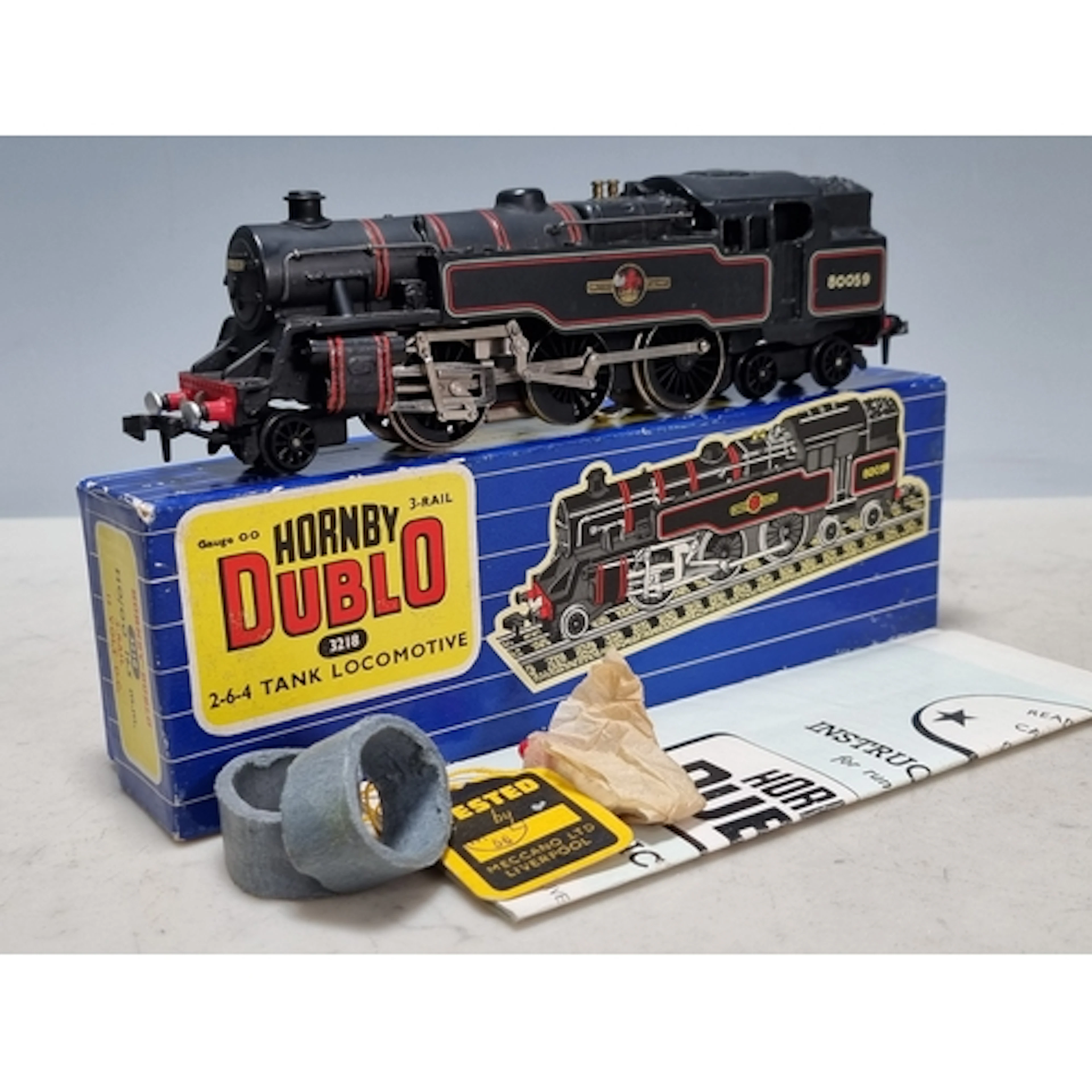 A boxed Hornby Dublo 3218 2-6-4T Locomotive, Nr M, has been ...