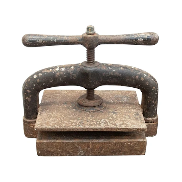 A Victorian cast iron book press. Wth a lion trademark to th...