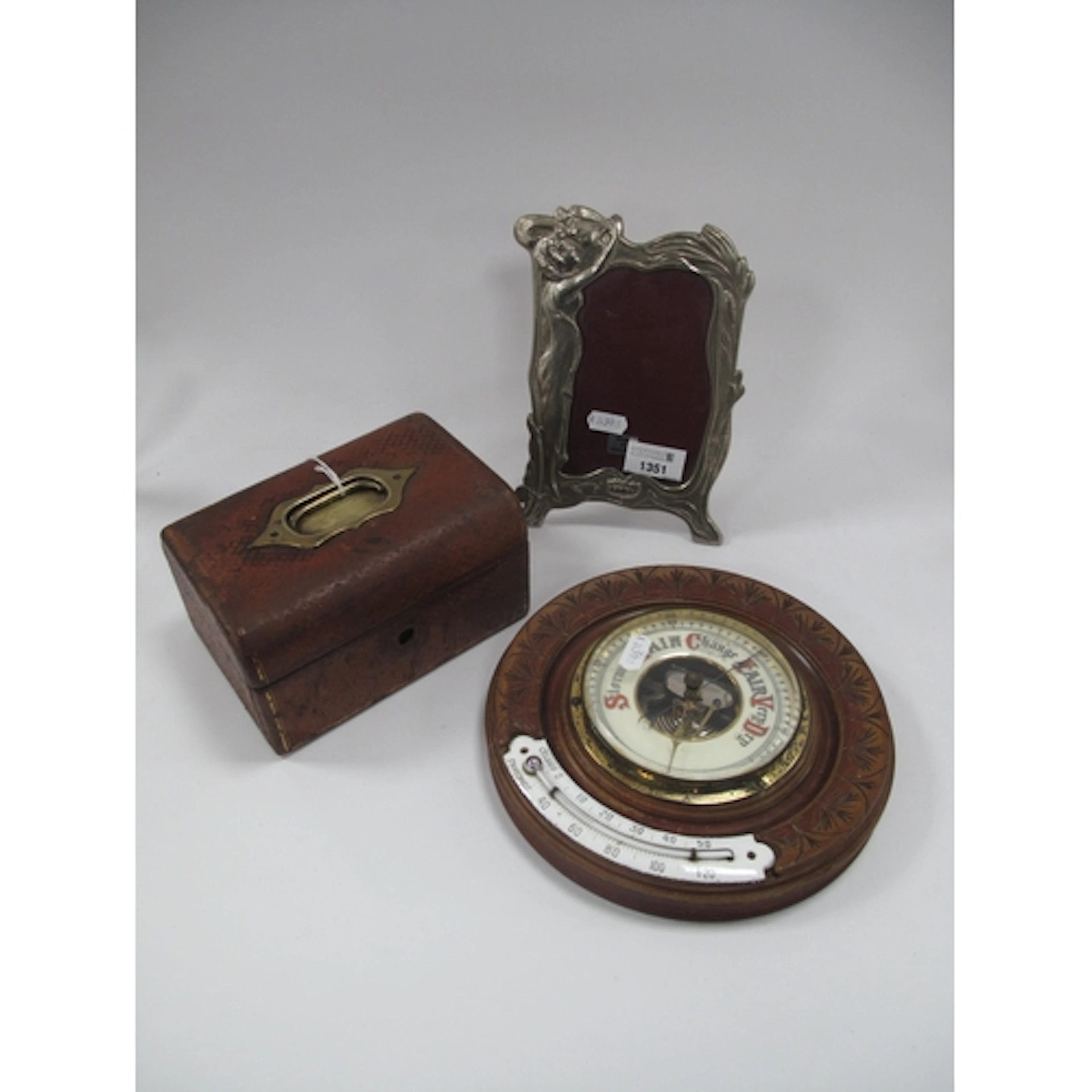 An Early 1900s Circular Oak Cased Barometer with curved whit...