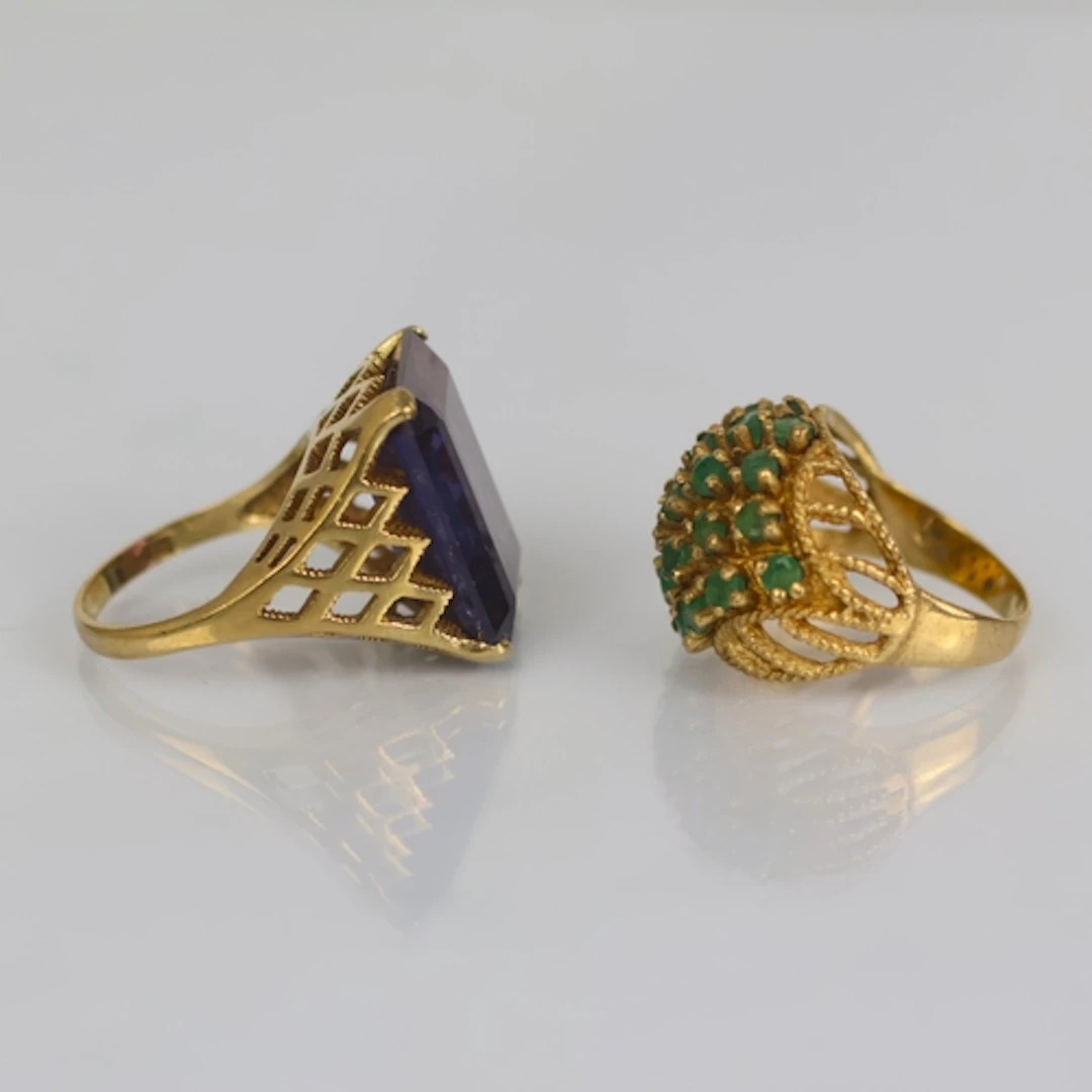 A contemporary amethyst cocktail ring, the emerald cut stone...