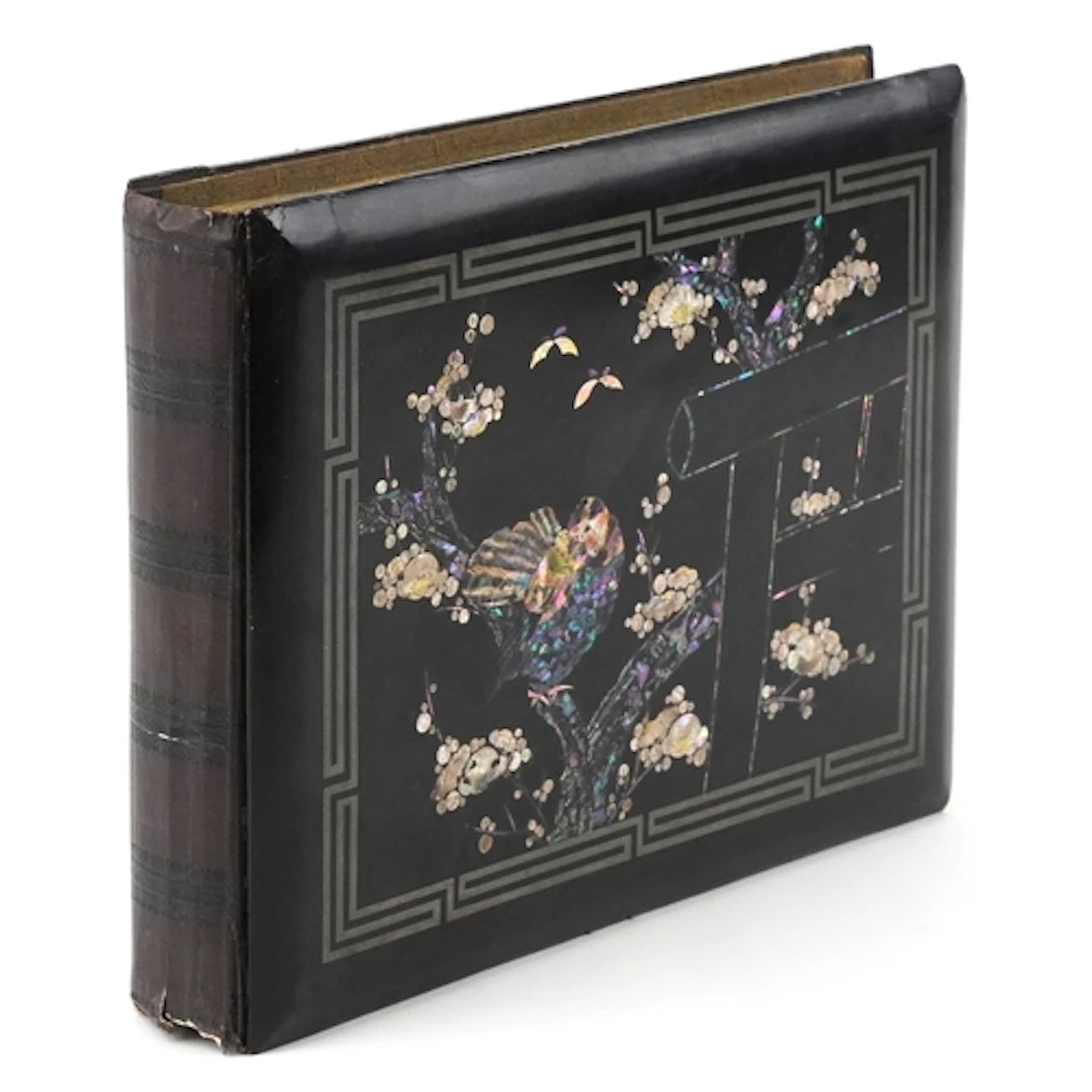 Chinese black lacquered photograph album having mother of pe...