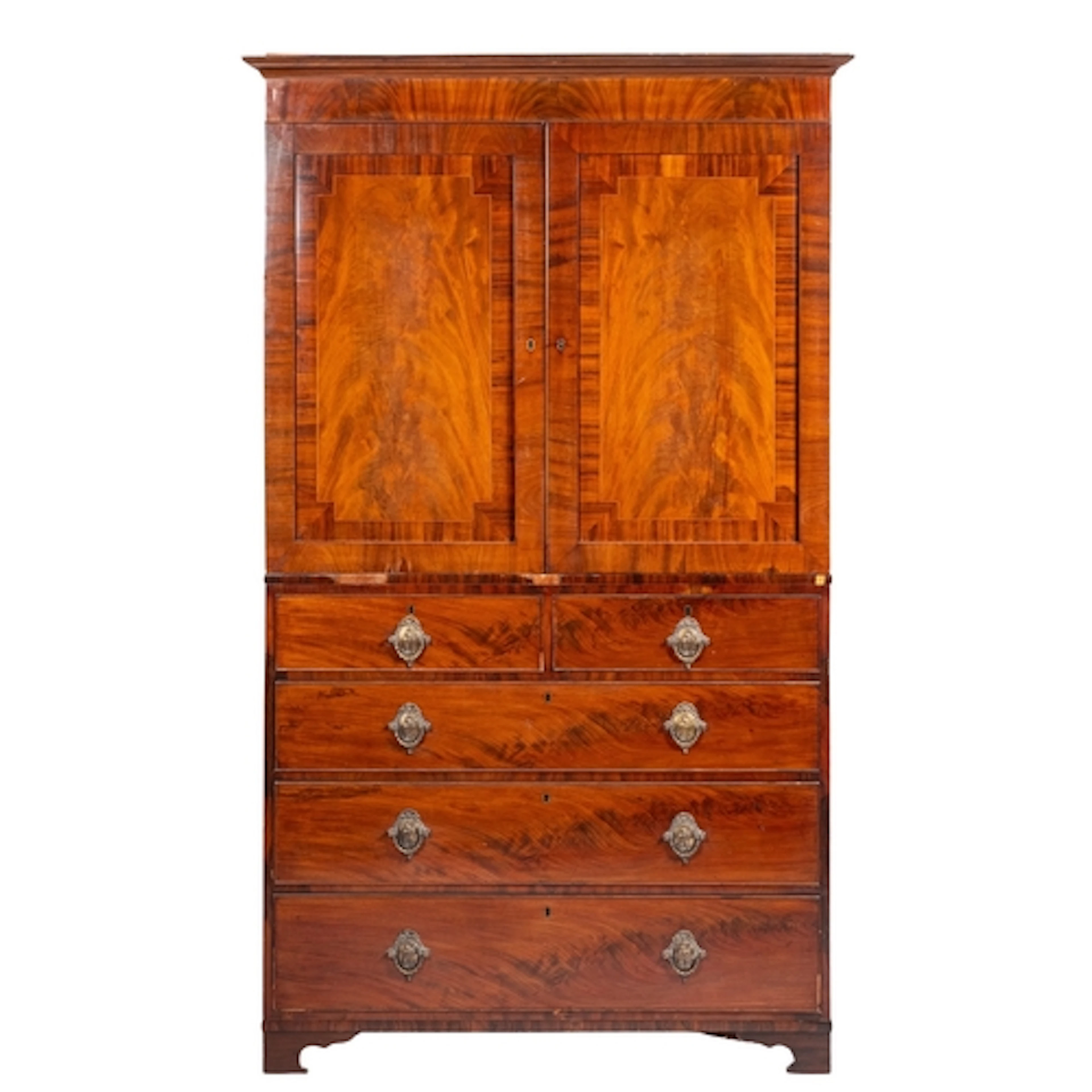A Regency mahogany and crossbanded linen press, early 19th c...